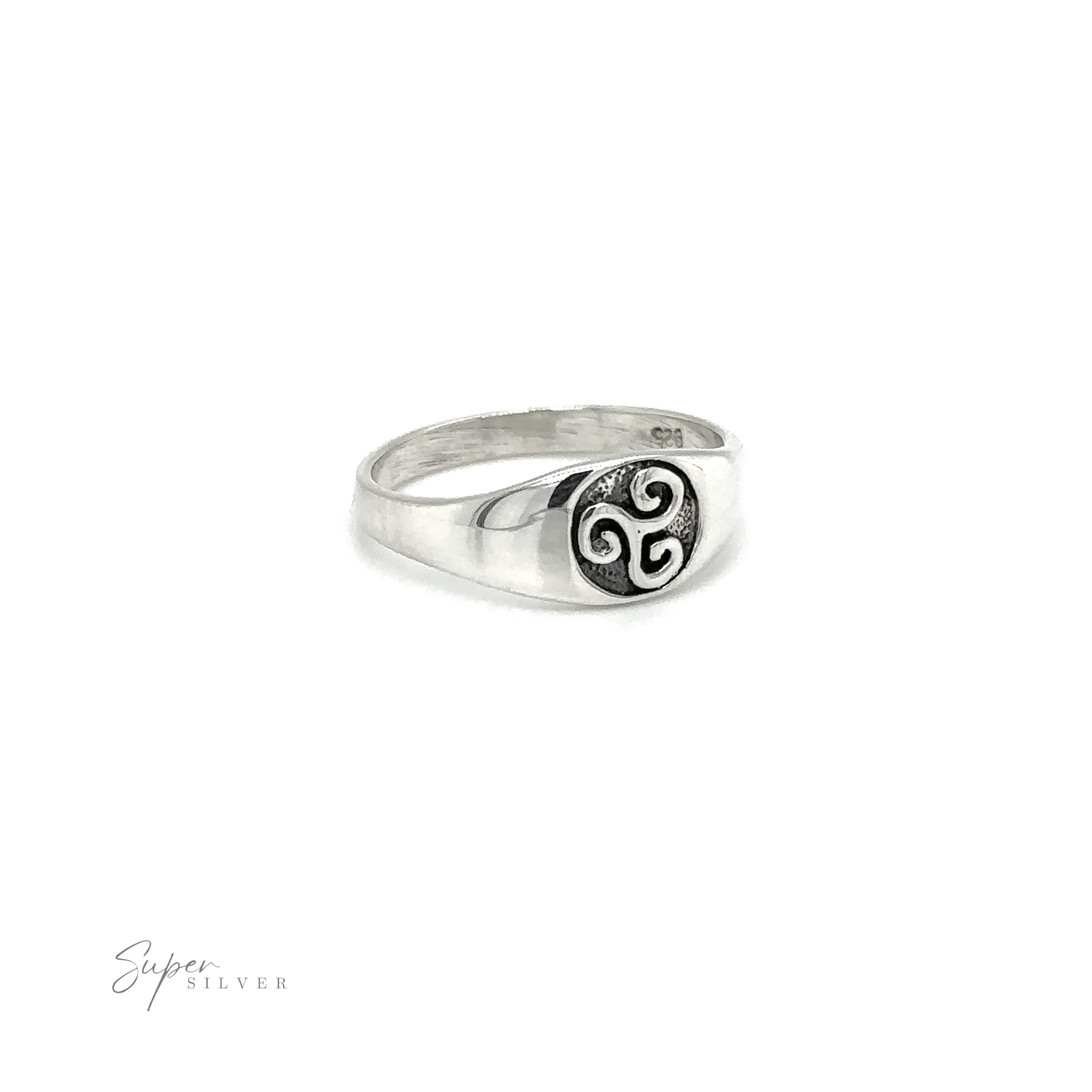 Description: A Celtic Spiral Signet Ring with a celtic symbol on it.