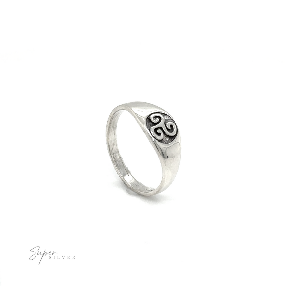 
                  
                    A Celtic Spiral Signet Ring with an om symbol on it.
                  
                