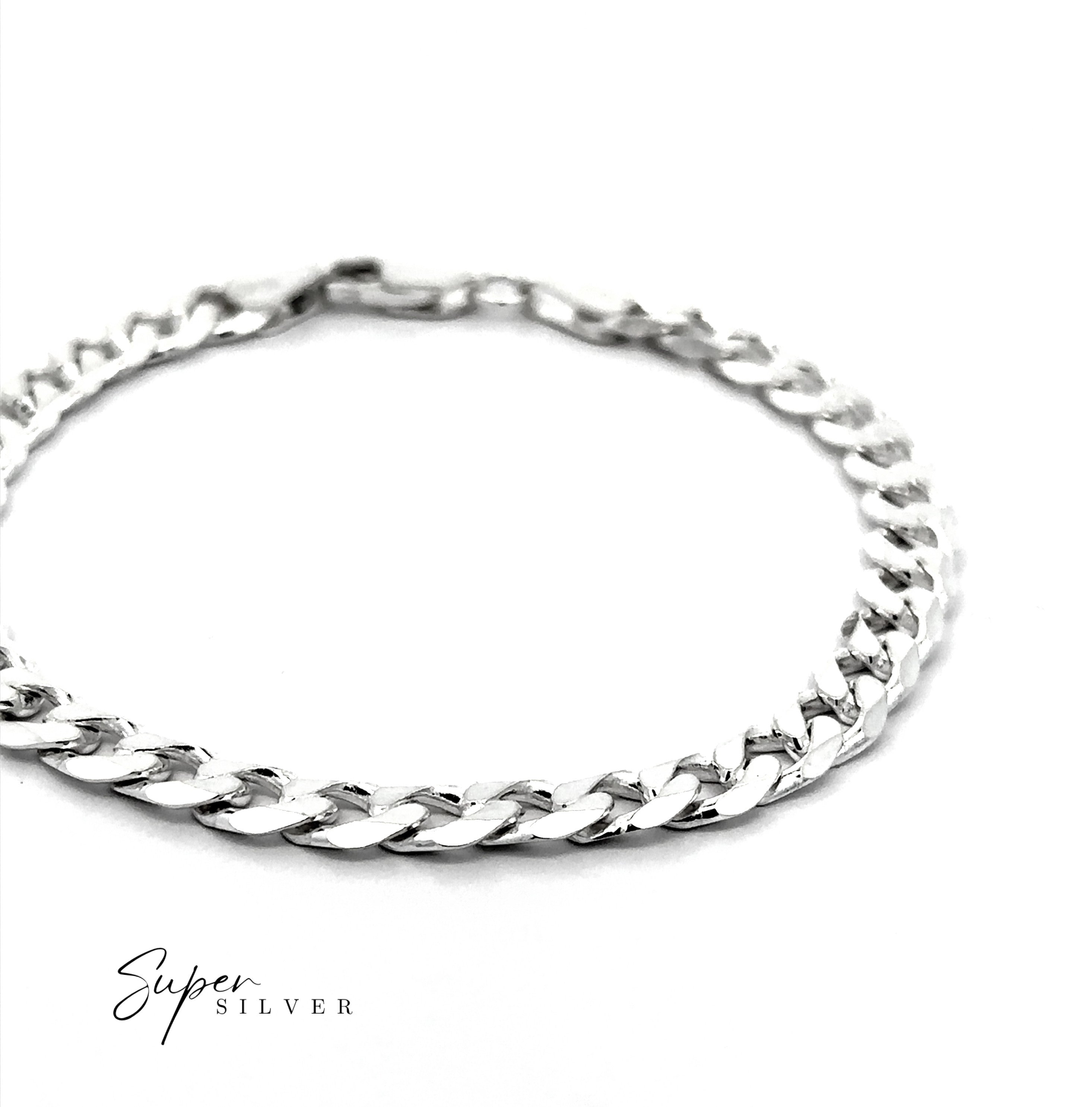 The Signature Italian Curb Chain, a sleek sterling silver bracelet, is displayed on a white background with "Super Silver" in the lower left corner.