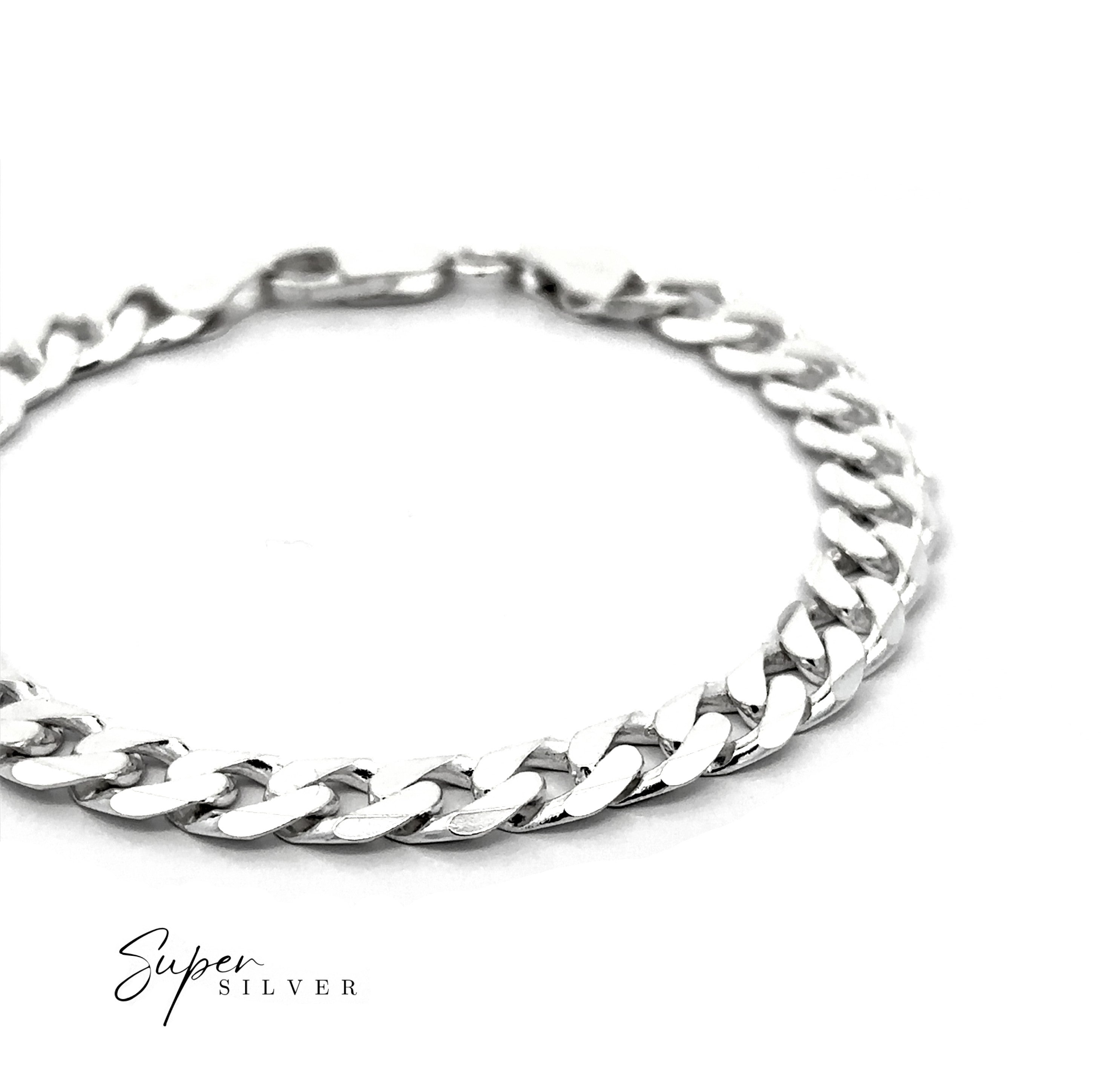 The Heavy Italian Curb Chain, a sterling silver bracelet with flat, interlocking links, is elegantly displayed on a white background. "Super Silver" appears in the lower left corner.