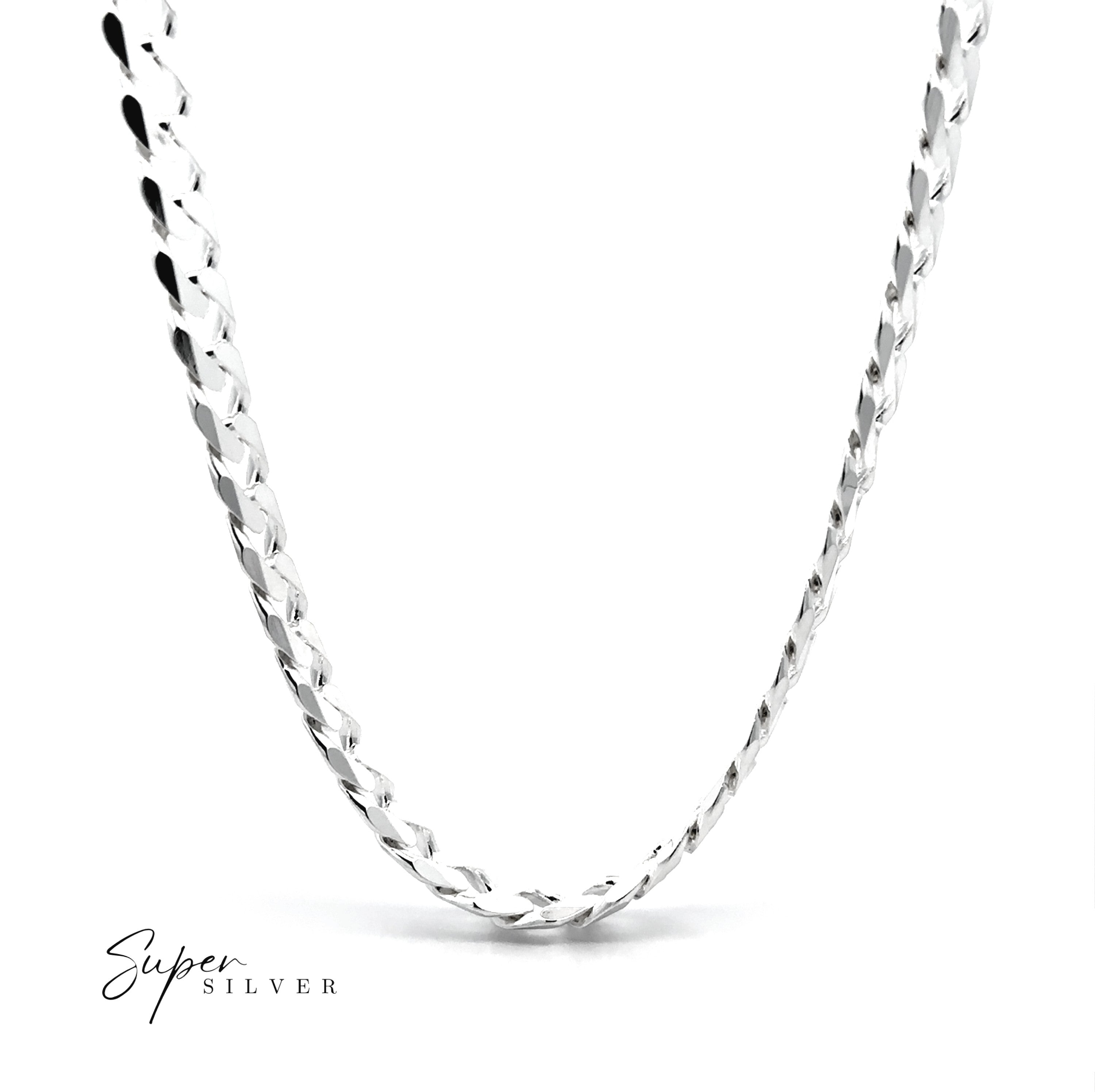 A close-up of the Heavy Italian Curb Chain, a polished silver necklace on a white background, with "Super Silver" in the bottom left corner.