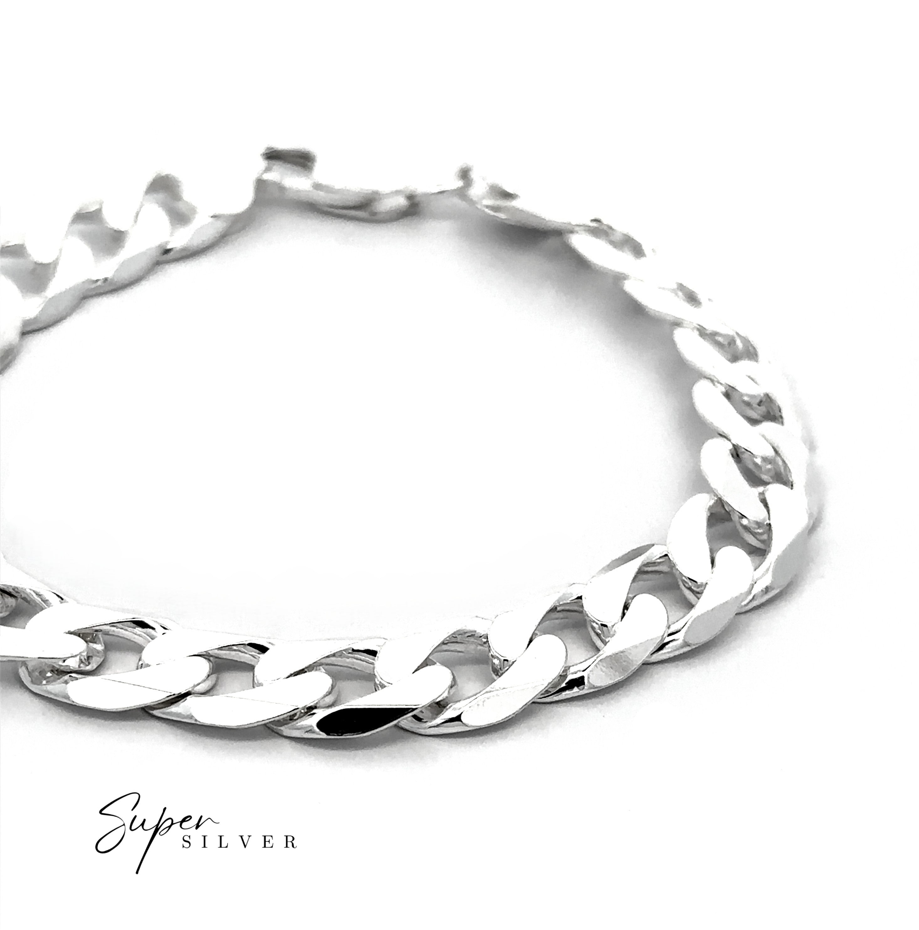 A close-up of the Heavy Italian Curb Chain, a polished sterling silver bracelet, displayed on a white background with "Super Silver" text in the lower left corner.