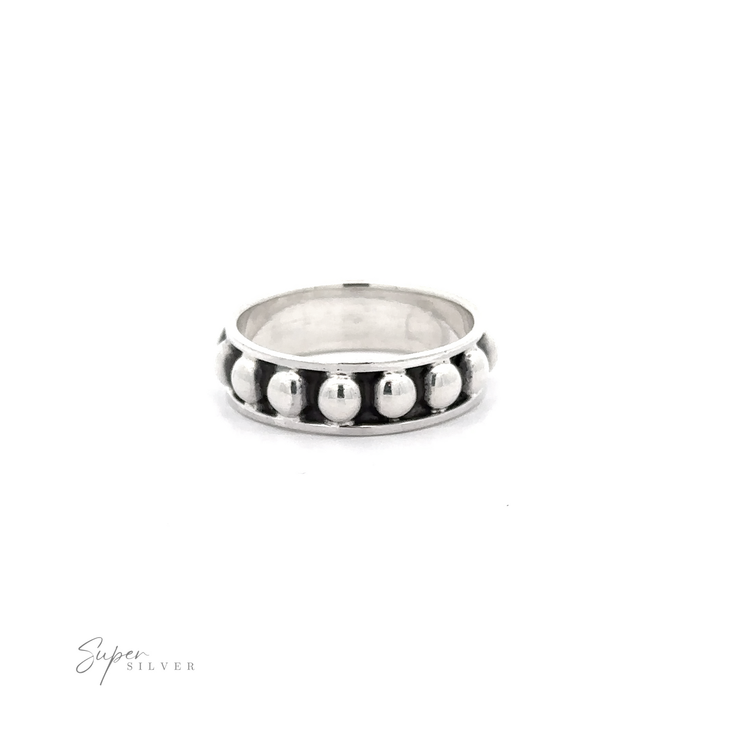 Sentence with product name: Silver ring featuring a Thick Oxidized Ball Band with a row of spherical beads, set against a plain white background.