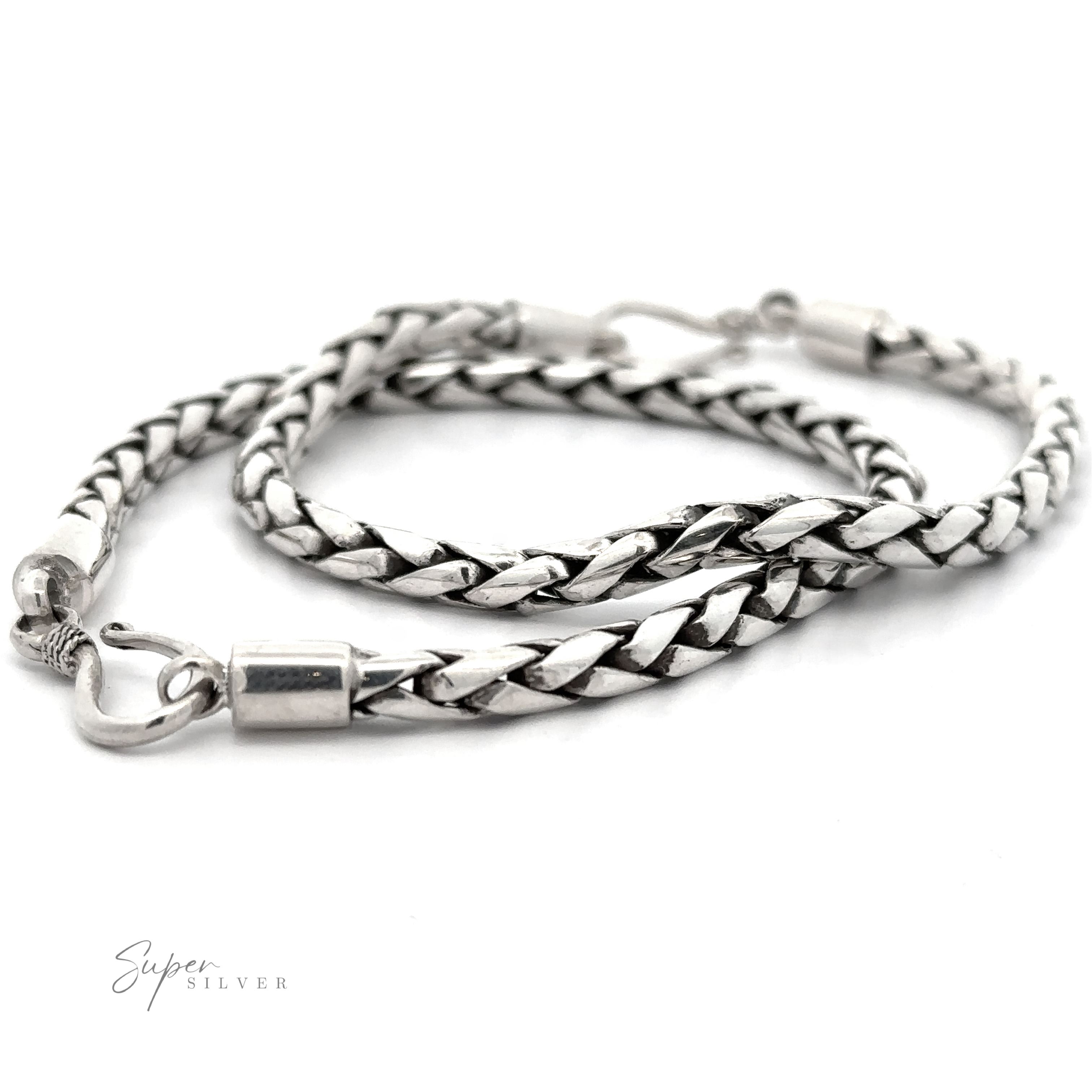 A 4mm Bright Rope Bracelet with a lobster clasp lies coiled on a white background, perfect for everyday and stacking. "Super Silver" is written in the bottom left corner, highlighting its .925 Sterling Silver quality.