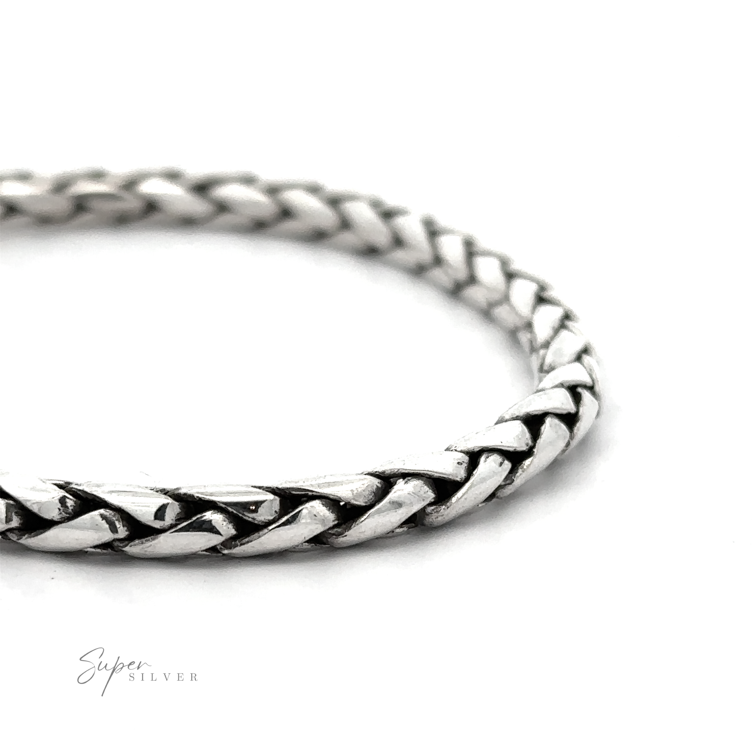 Close-up of a sterling silver woven rope bracelet, 7 inch length, against a white background, labeled "4mm Bright Rope Bracelet" in the bottom left corner.