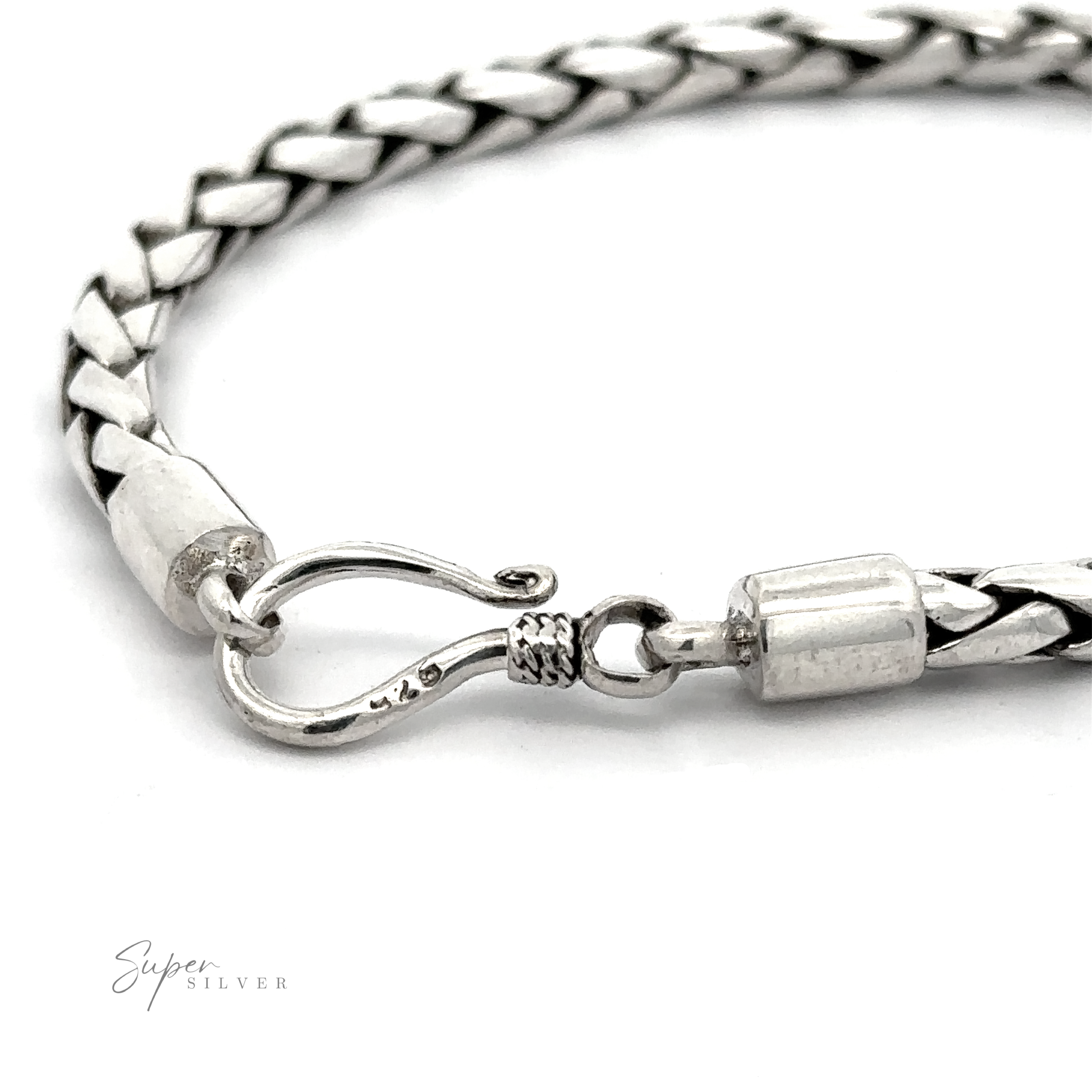 Close-up of a 4mm Bright Rope Bracelet made from silver braided ropes, featuring a hook clasp. The text ".925 Sterling Silver" appears in the lower left corner.