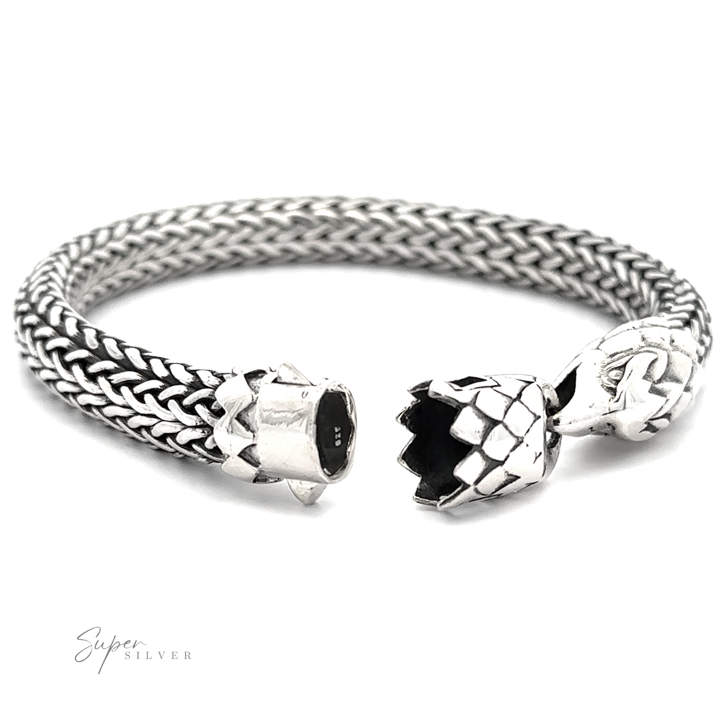 A Heavy Braided Bracelet with Eagle Clasp, featuring dragon head-shaped ends. Crafted from .925 Sterling Silver, the bracelet is open at one end, displaying intricate detailing. The words "Super Silver" are inscribed at the bottom left.