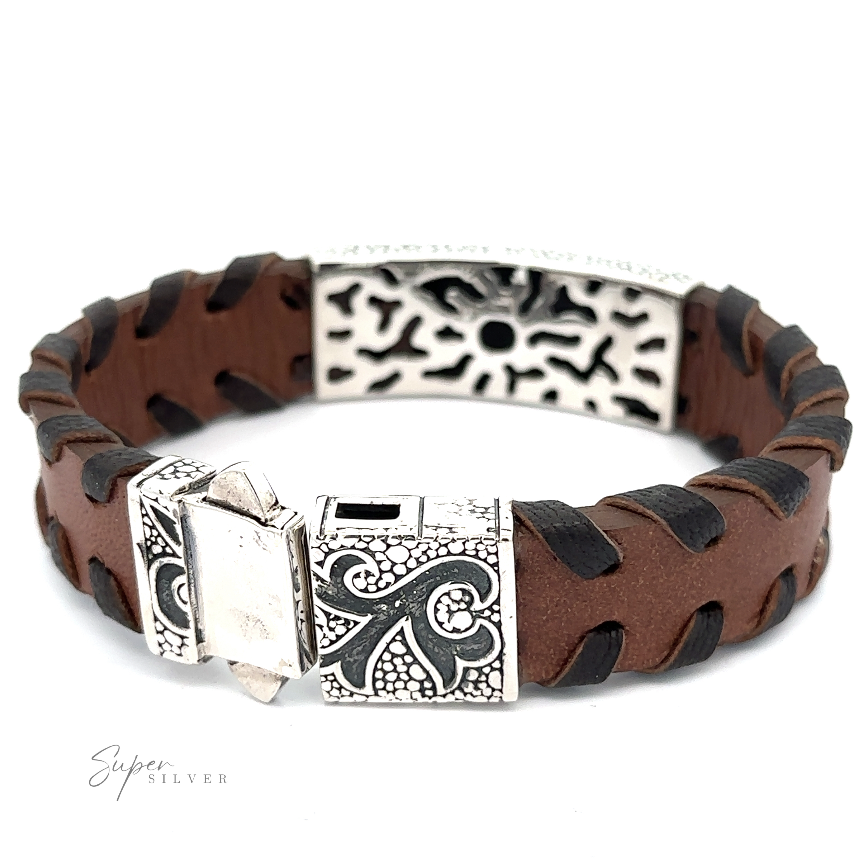 A Tribal Leather Bracelet with a brown leather strap, featuring a tribal silver center and decorative clasp with intricate designs. The brand name "Super Silver" is visible on the clasp.