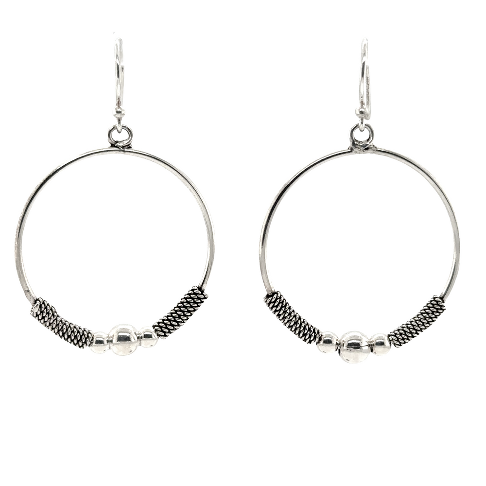 A pair of Super Silver .925 sterling silver Bali Style Circle Drop Earrings with black beads, approximately 2 inches in length. These elegant Bali style drop earrings are perfect for any occasion.