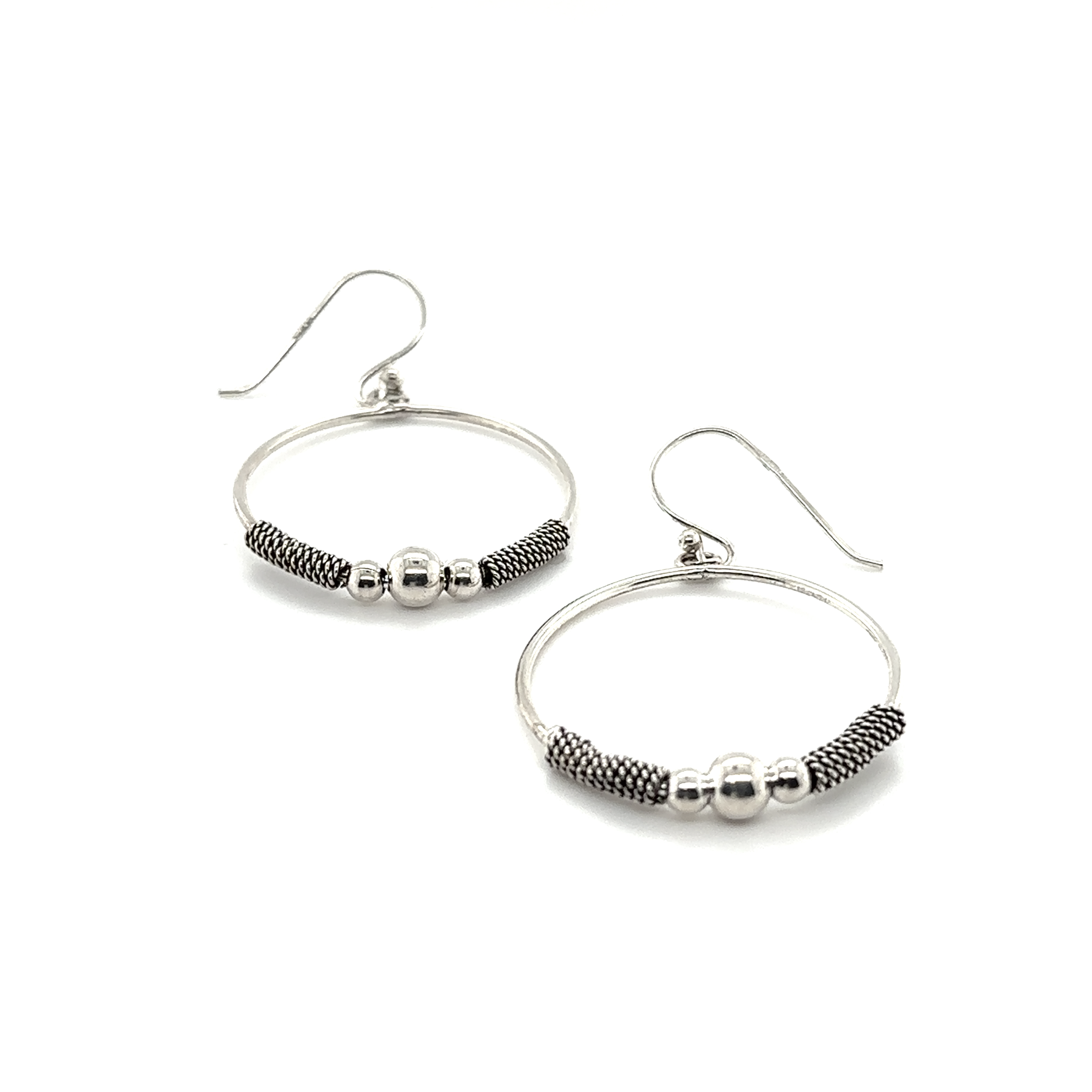 A pair of Super Silver Bali Style Circle Drop Earrings with black beads, in a bali style drop design that has an approximate length.
