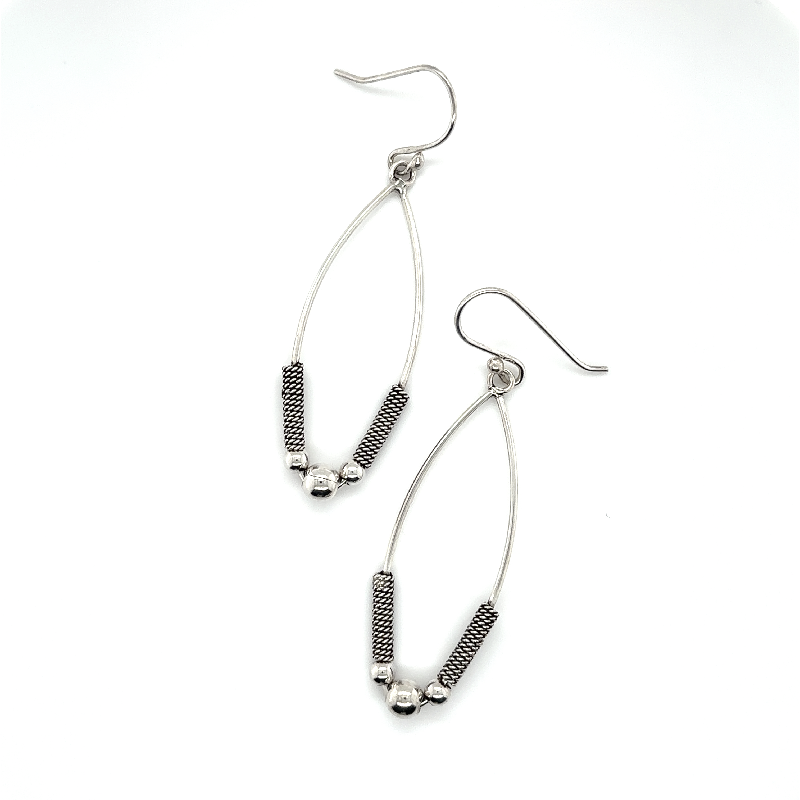 A pair of Super Silver Bali Style Marquise Drop Earrings with black beads.