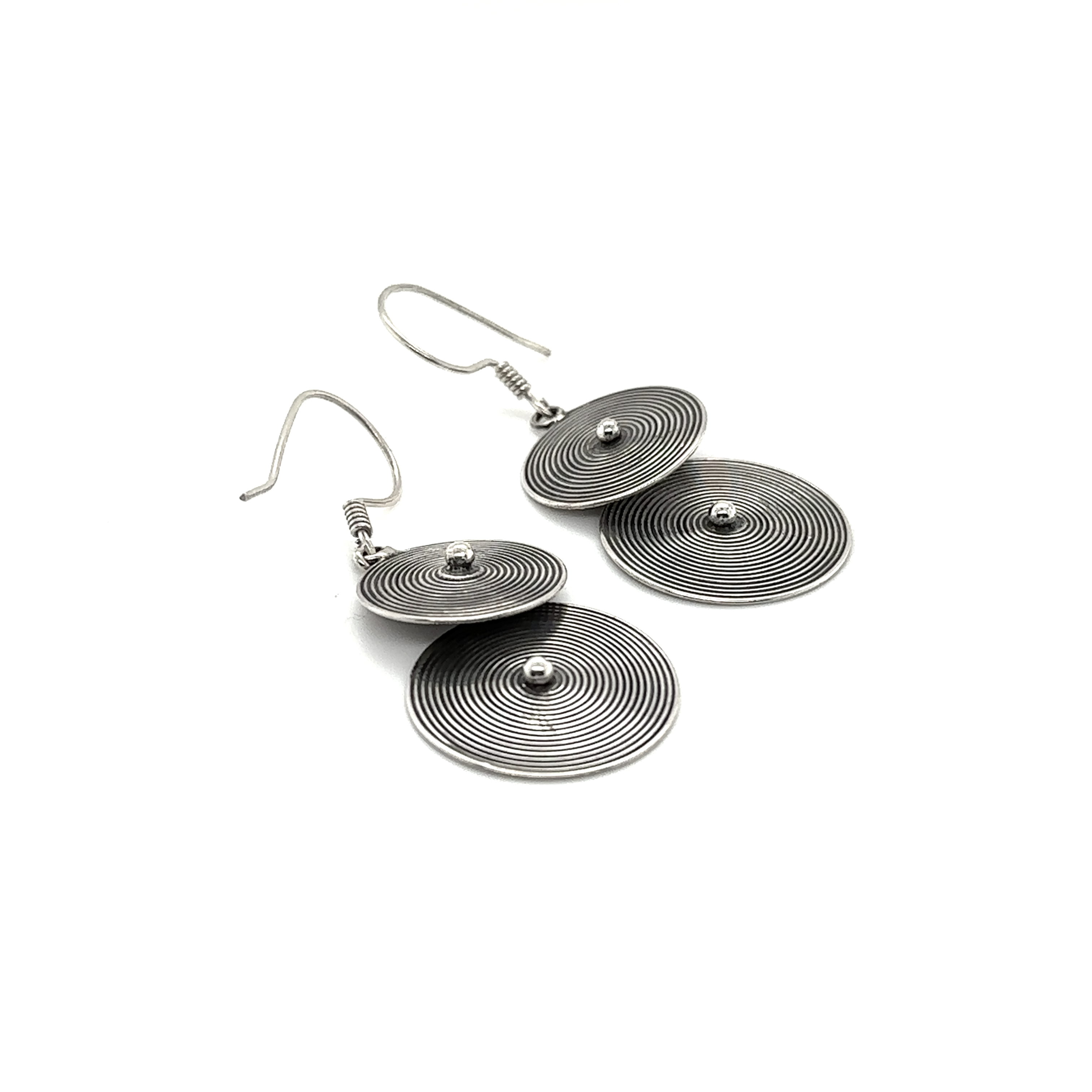 Two Bali Earrings with Two Spiral Disks by Super Silver on a white background.