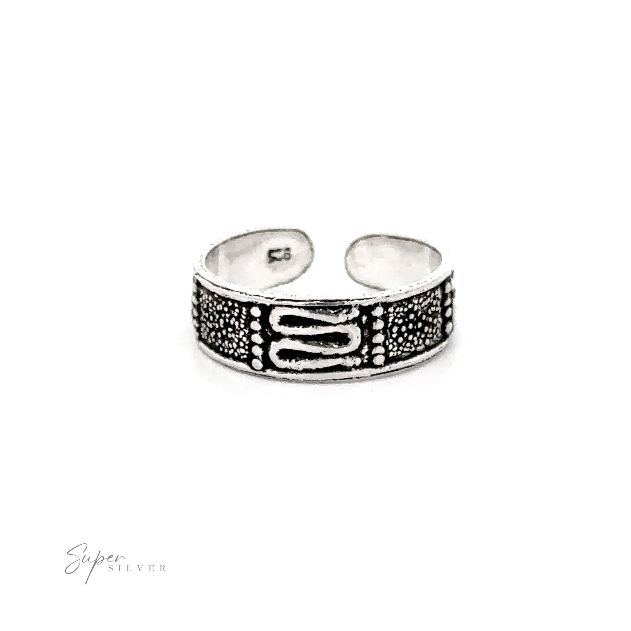 Bali Design adjustable toe ring with an oxidized sterling silver band and textured buckle-like design, displayed on a white background.