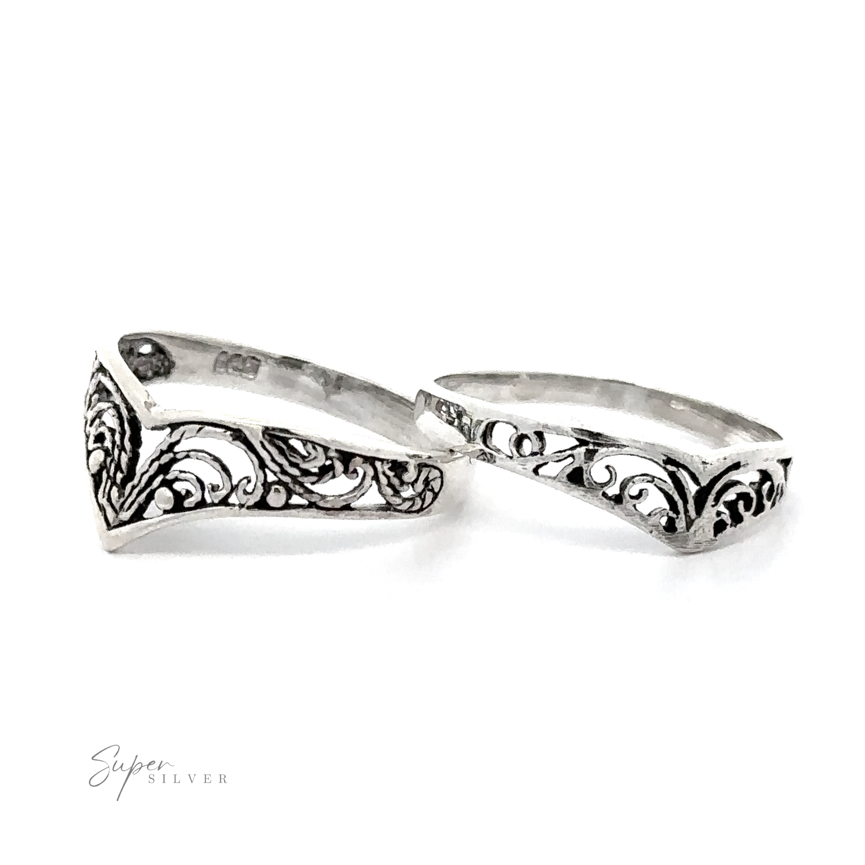 Two timeless classic Chevron rings with filigree designs on them.