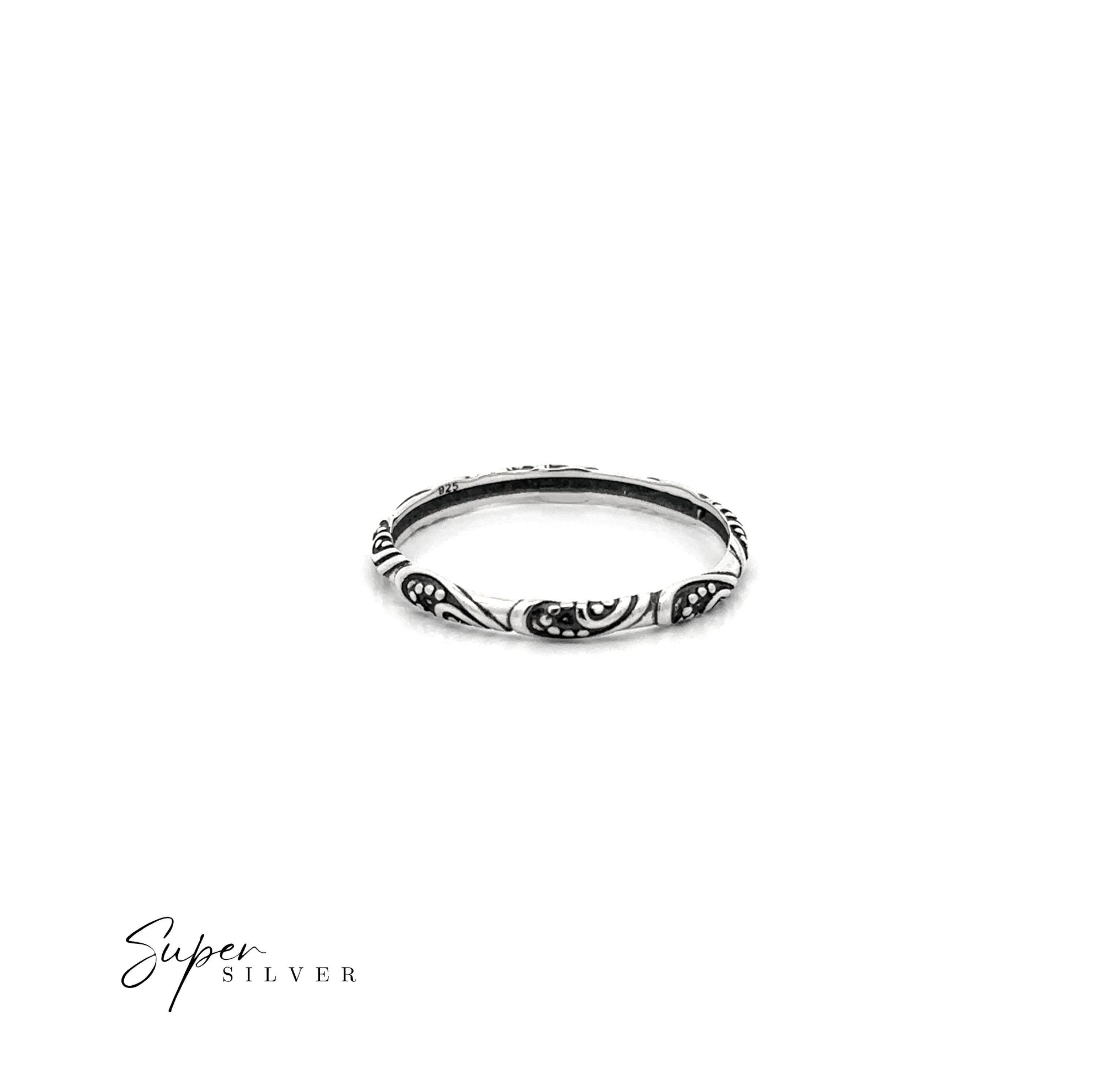 The Delicate Bali Style Band, a slim sterling silver ring with an engraved pattern, is shown on a plain white background. "Super Silver" is displayed in the bottom left corner.