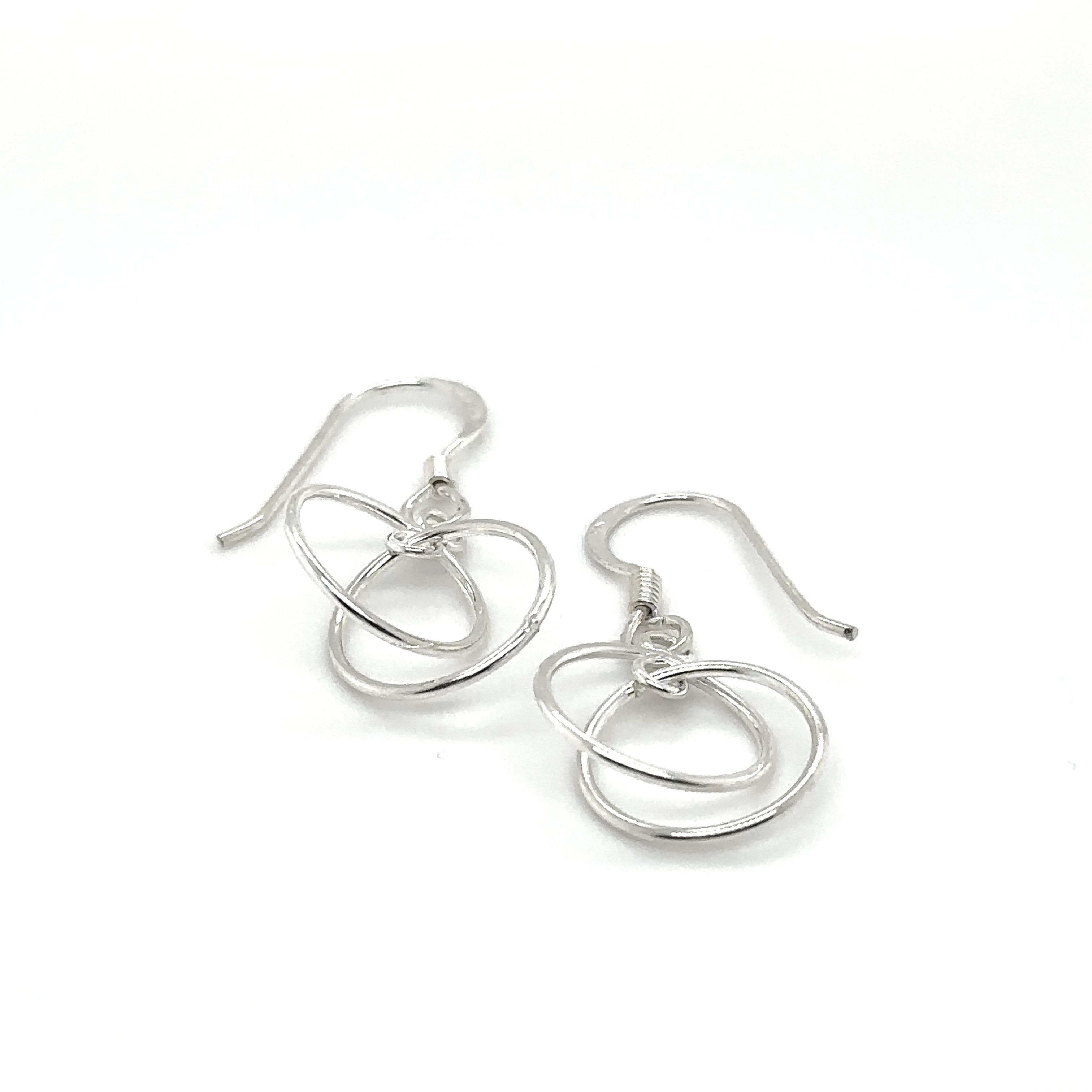 Super Silver's Interlinked Circle Earrings, crafted from .925 Sterling Silver, with a swirl design.