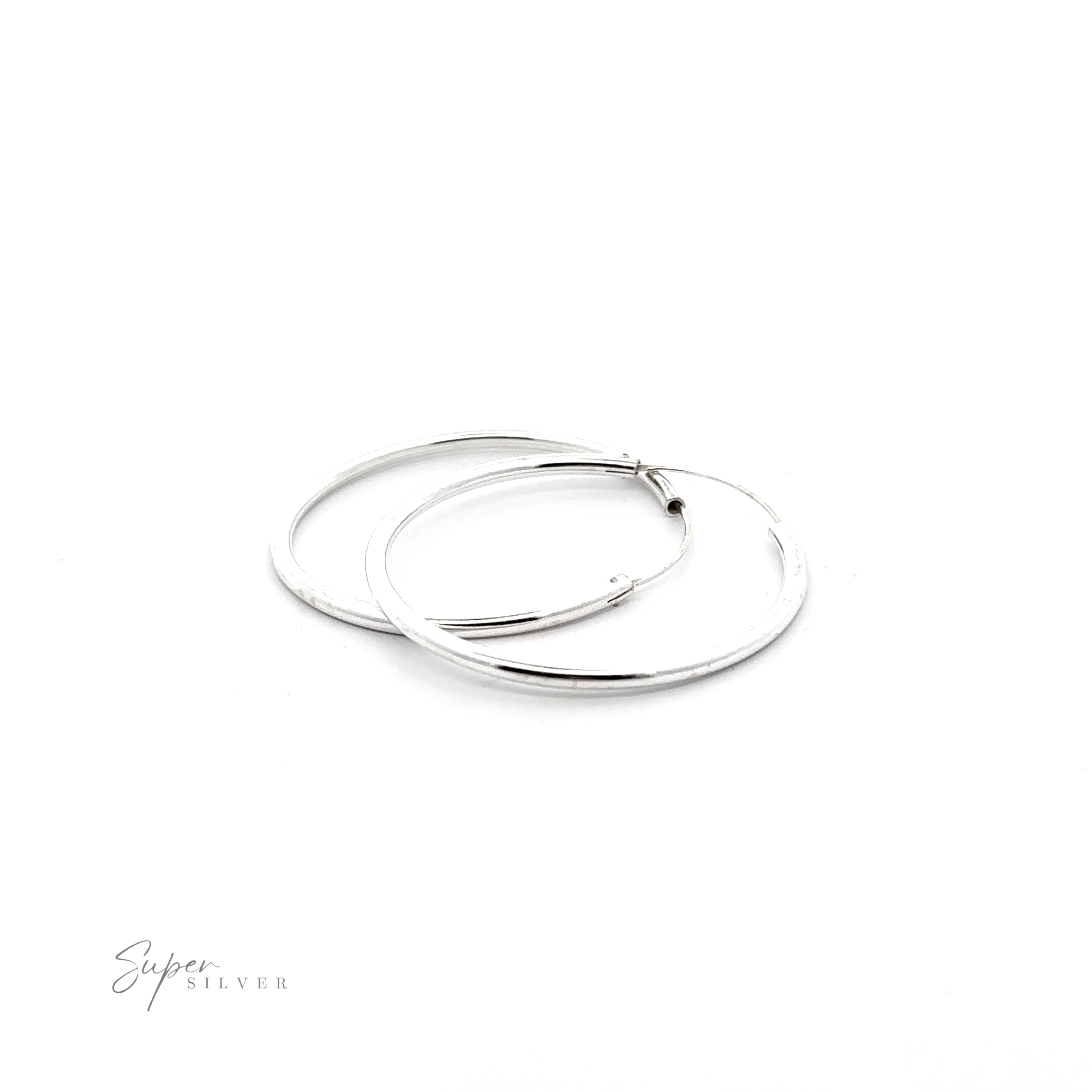 A versatile pair of 2.5mm Infinity Hoops on a white background.