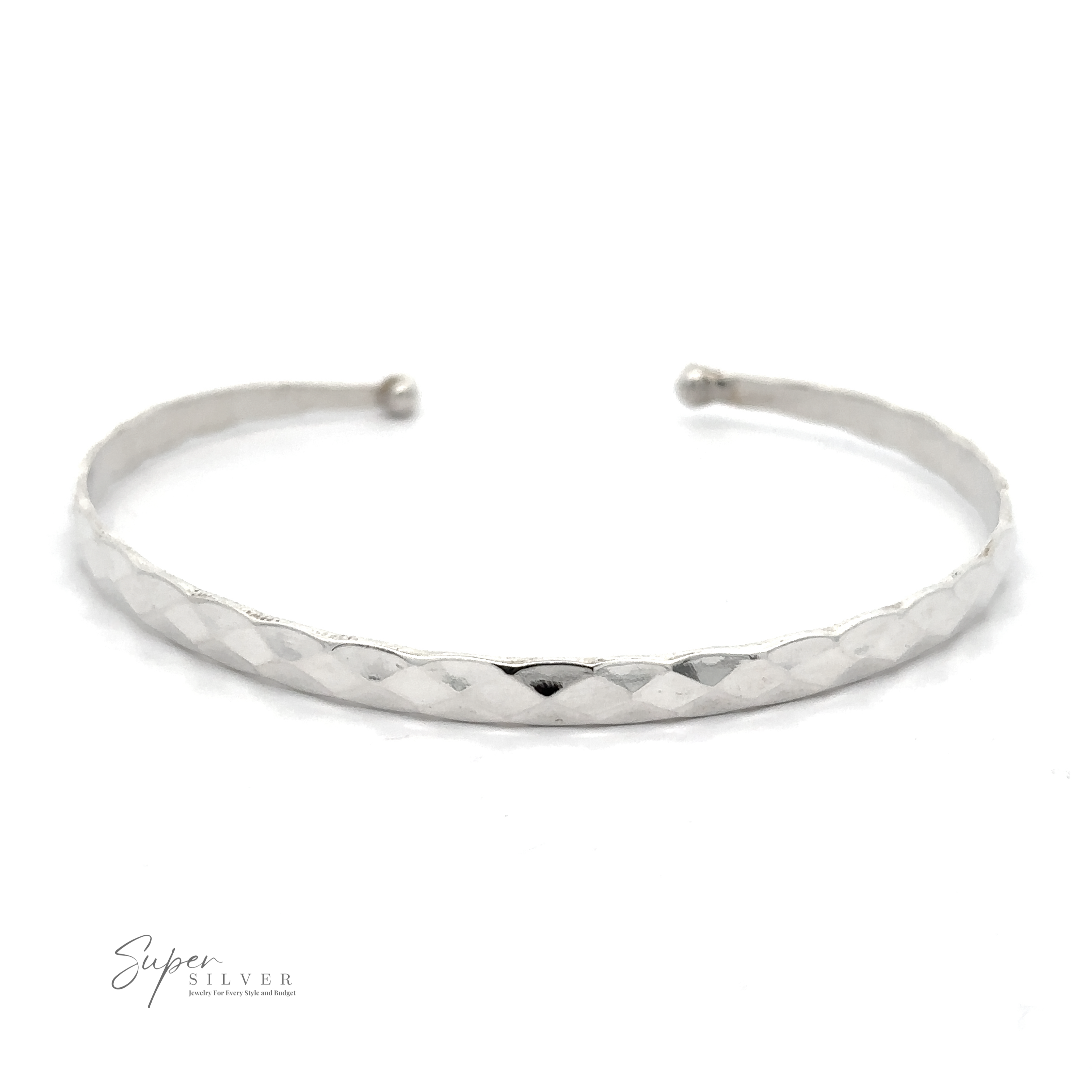 A Stackable Hammered Cuff bracelet with a textured, diamond pattern surface is shown against a white background. The text "Super Silver" appears in the lower-left corner, highlighting its timeless look.