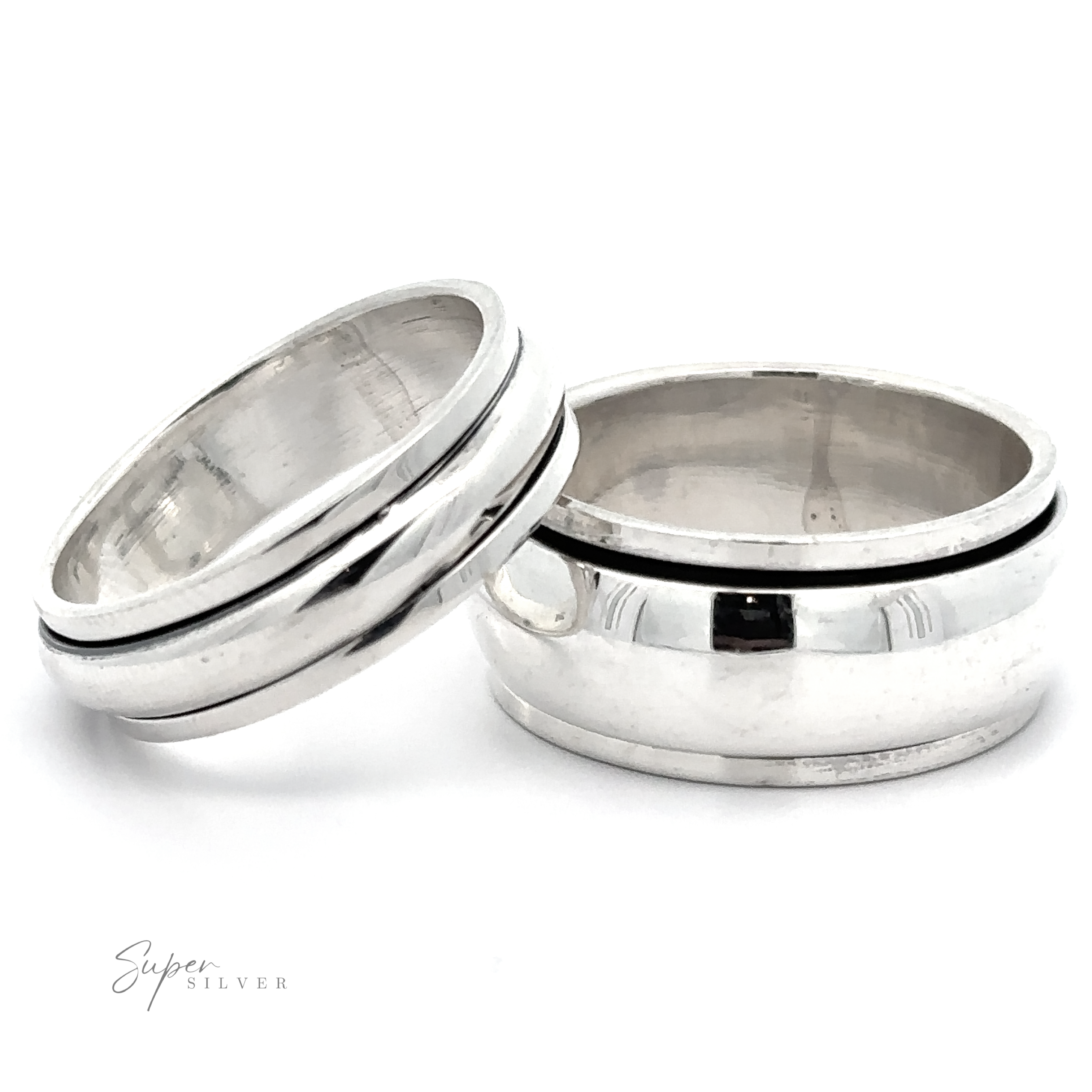 Two Plain Rounded Spinner Rings crafted from .925 Sterling Silver on a pristine white background.