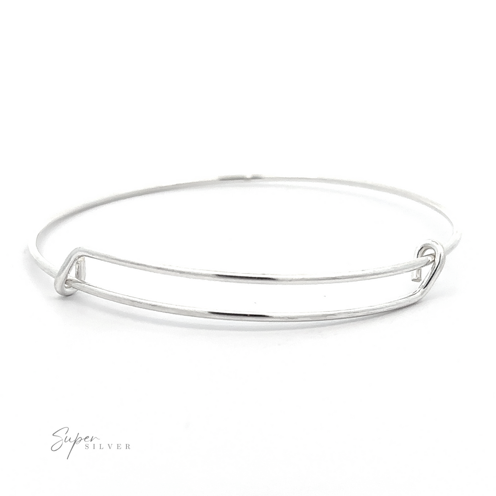 
                  
                    A minimalist Simple Adjustable Bangle Bracelet featuring a sleek wire design and a small logo "Super Silver" in the bottom left corner.
                  
                