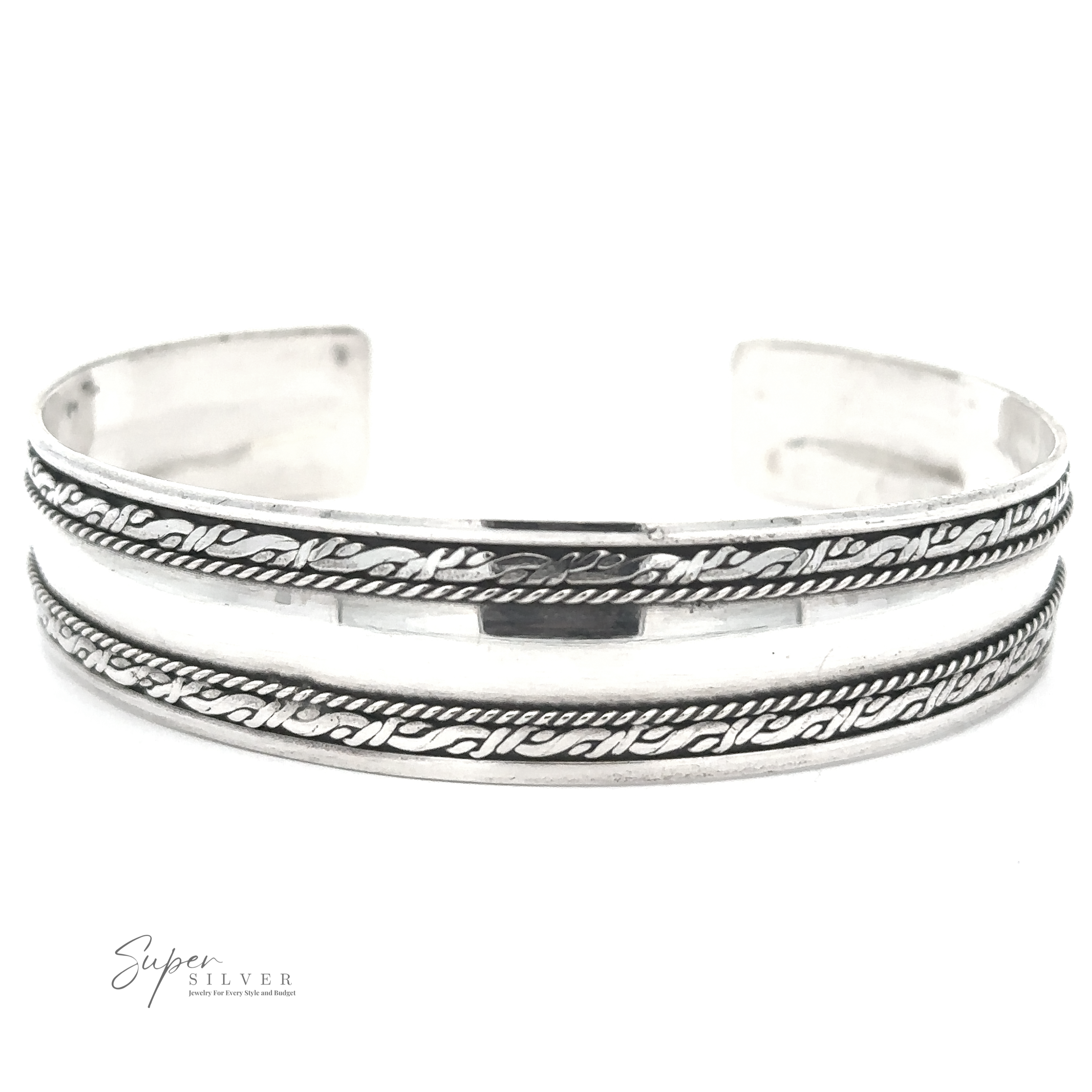 A Silver Domed Cuff with Rope Pattern featuring intricate designs and patterns with an open cuff style, crafted from .925 Sterling Silver and branded "Super Silver" in the lower left corner, inspired by Bali's rich artistic heritage.