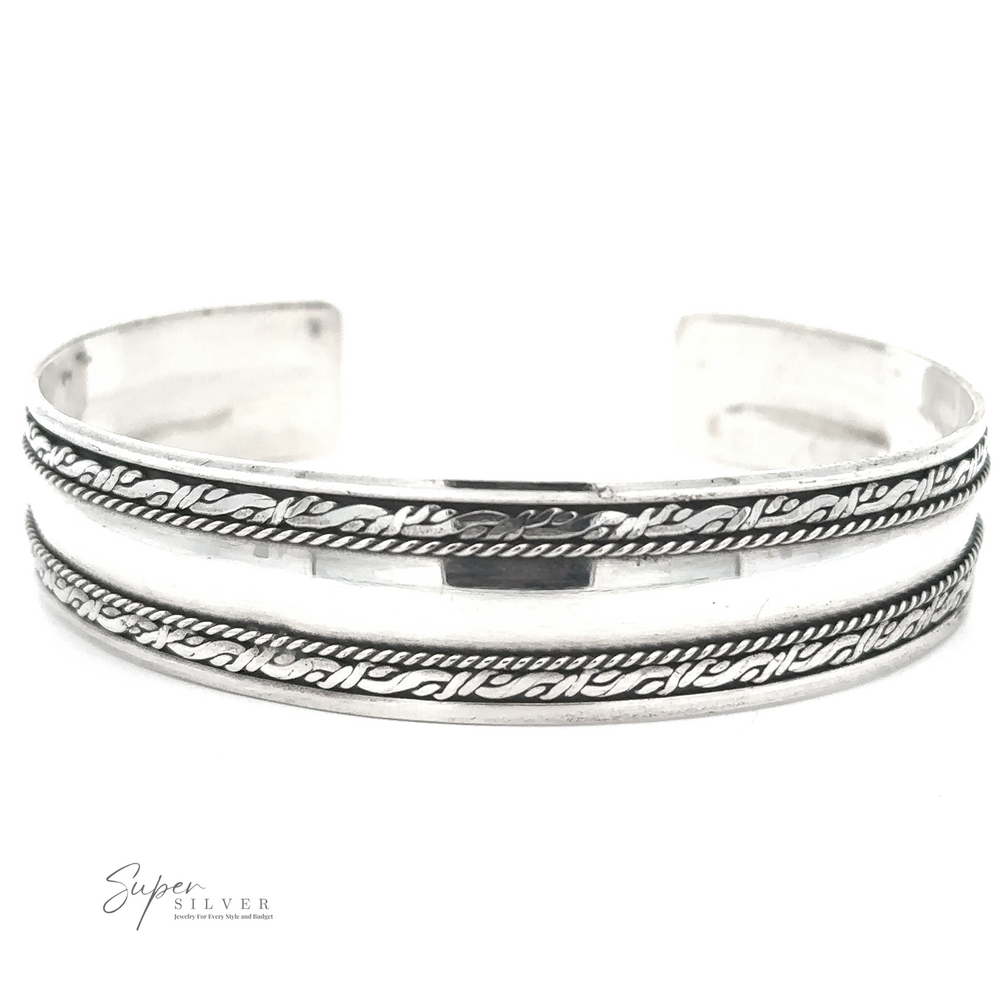 
                  
                    A Silver Domed Cuff with Rope Pattern featuring intricate designs and patterns with an open cuff style, crafted from .925 Sterling Silver and branded "Super Silver" in the lower left corner, inspired by Bali's rich artistic heritage.
                  
                