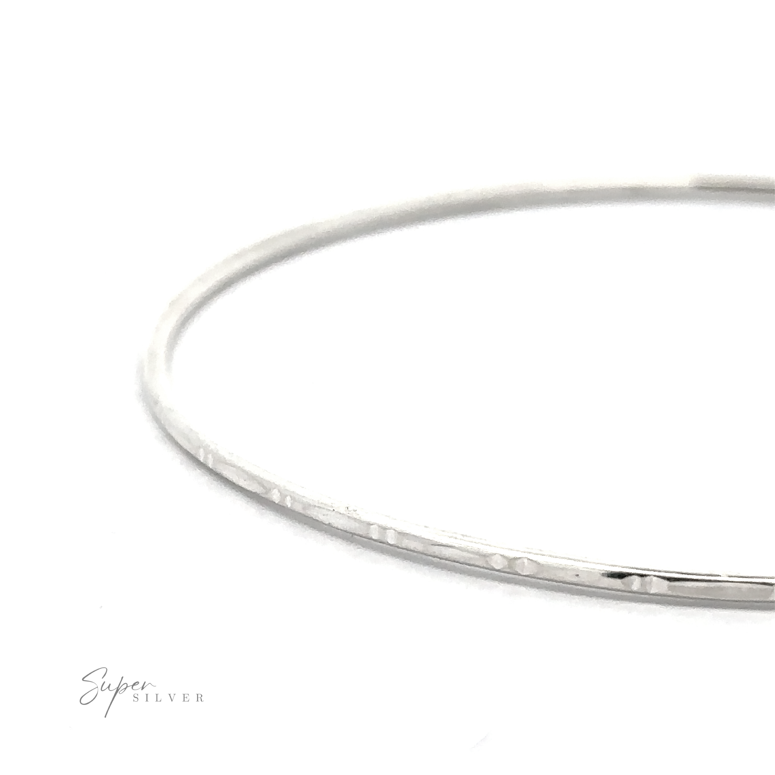 A simple, thin Delicate Faceted Cut Bangle Bracelet displayed on a white background with the words "Super Silver" in the bottom left corner.