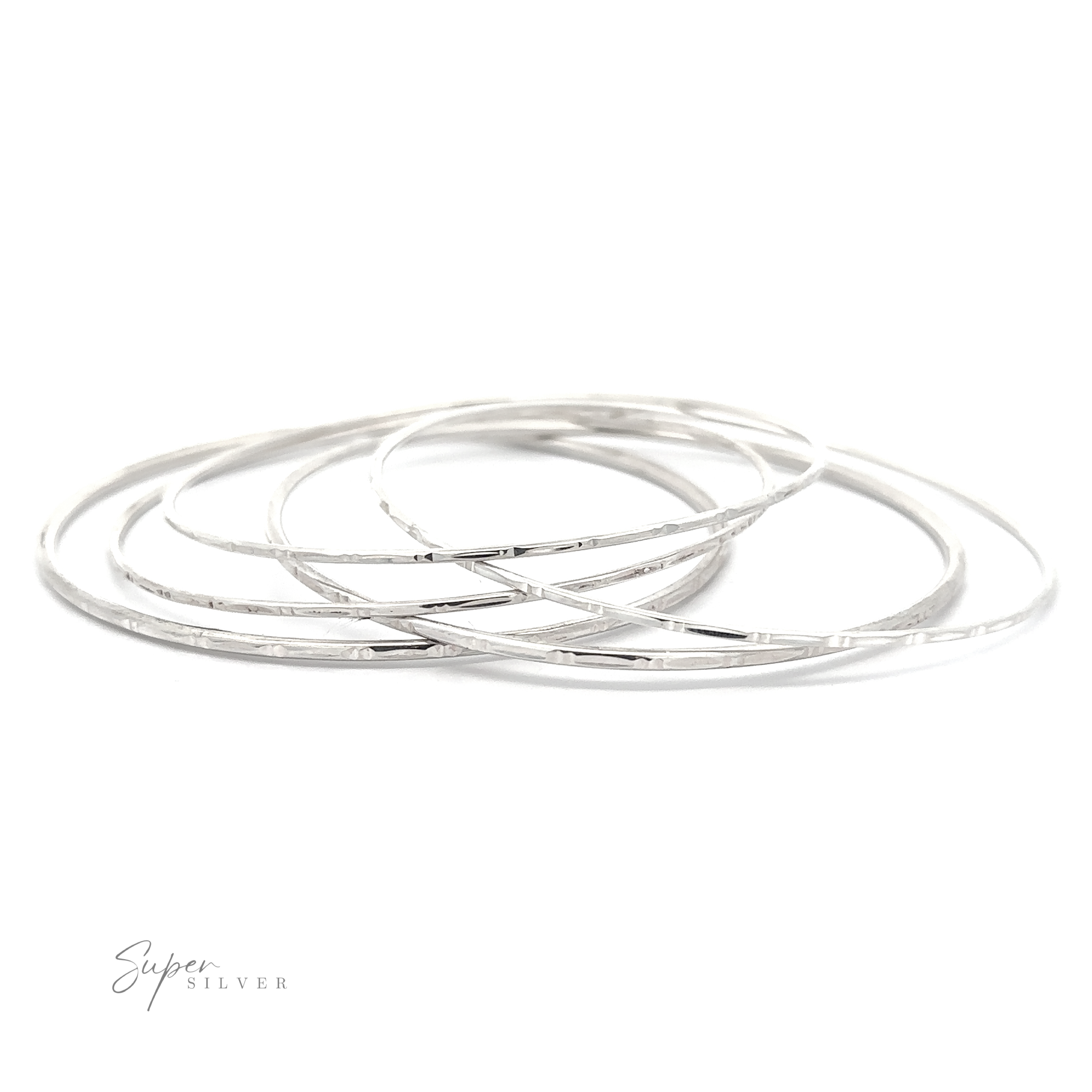 A set of five Sparkling Faceted Bangle Bracelets arranged in an overlapping fashion on a white background. The surface appears smooth and shiny.