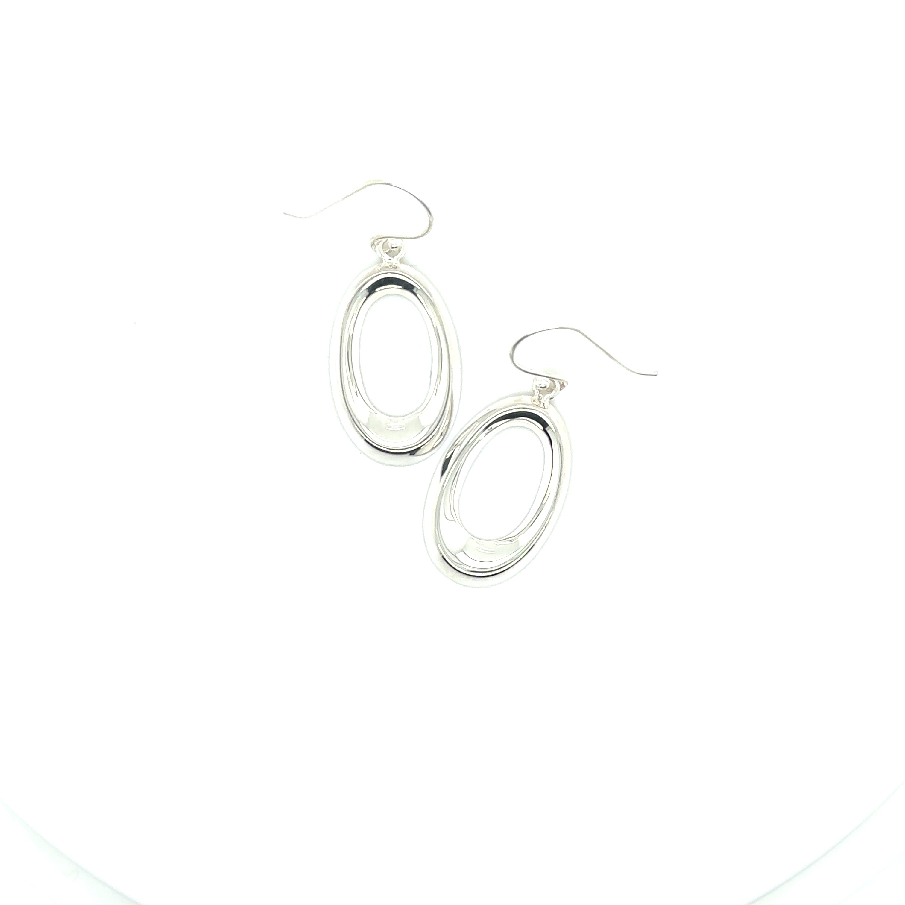 A pair of Super Silver Open Teardrop Earrings on a white background.