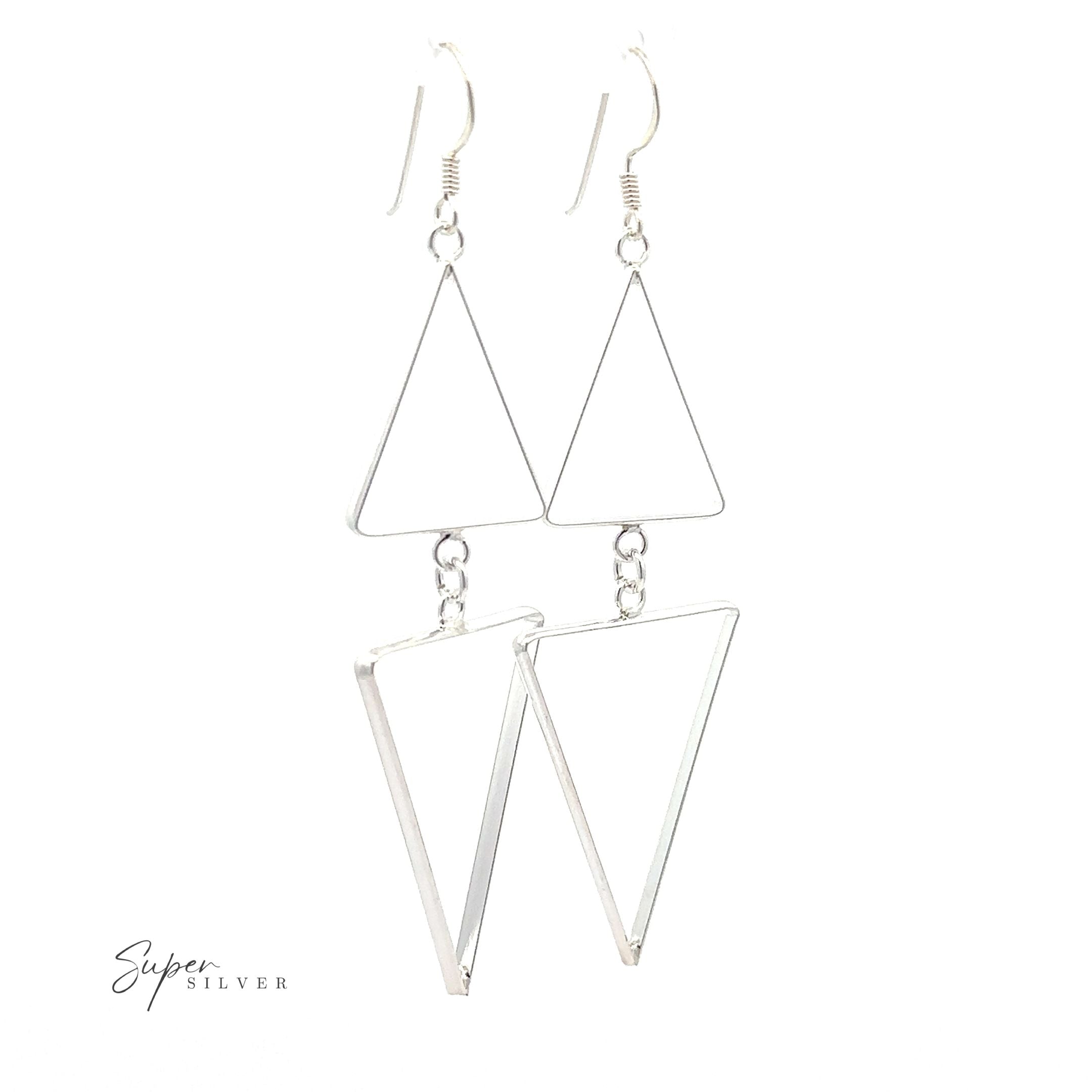Long Modern Double Triangle Earrings meet sterling silver in this pair of triangle earrings displayed against a white background.