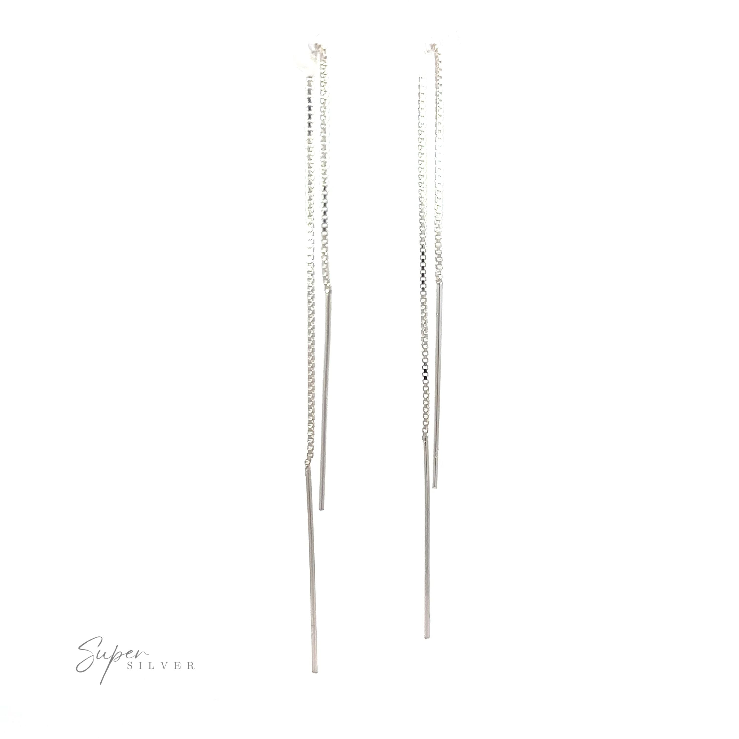 These Simple Silver Wire Threader earrings are made of sterling silver and feature a long chain for a minimalist look.