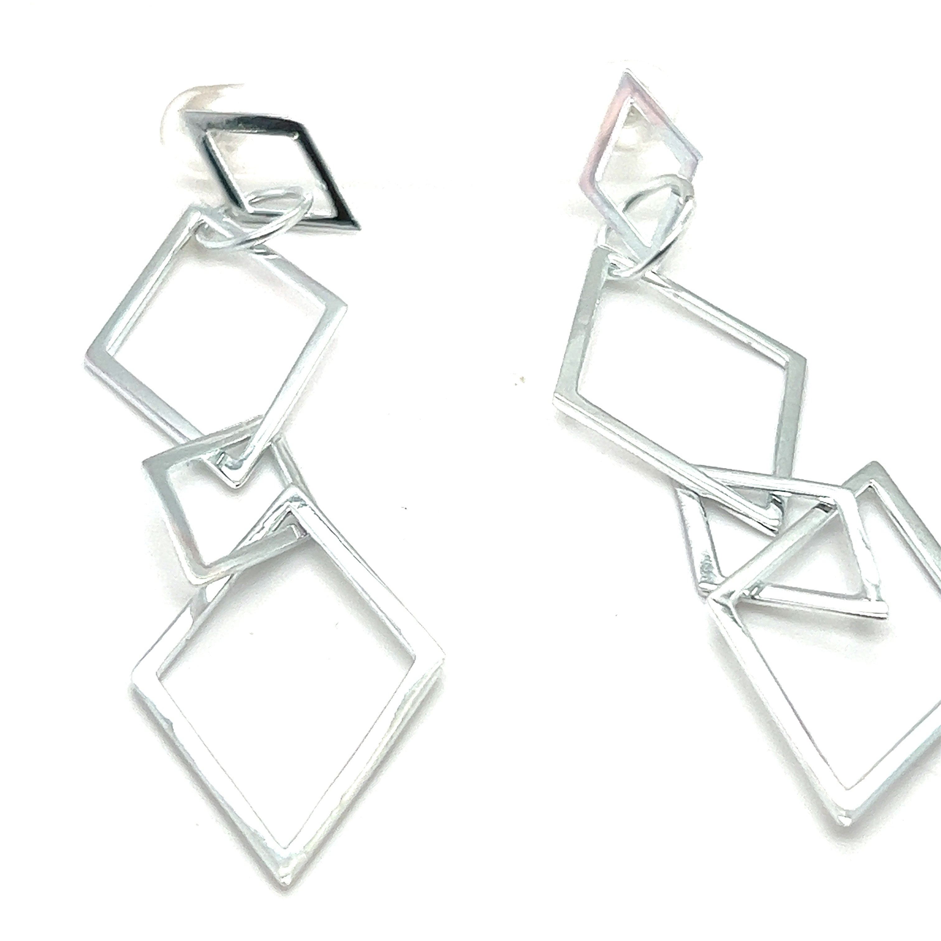 Super Silver's Long Interconnected Diamond Shaped Earrings with contemporary elegance.