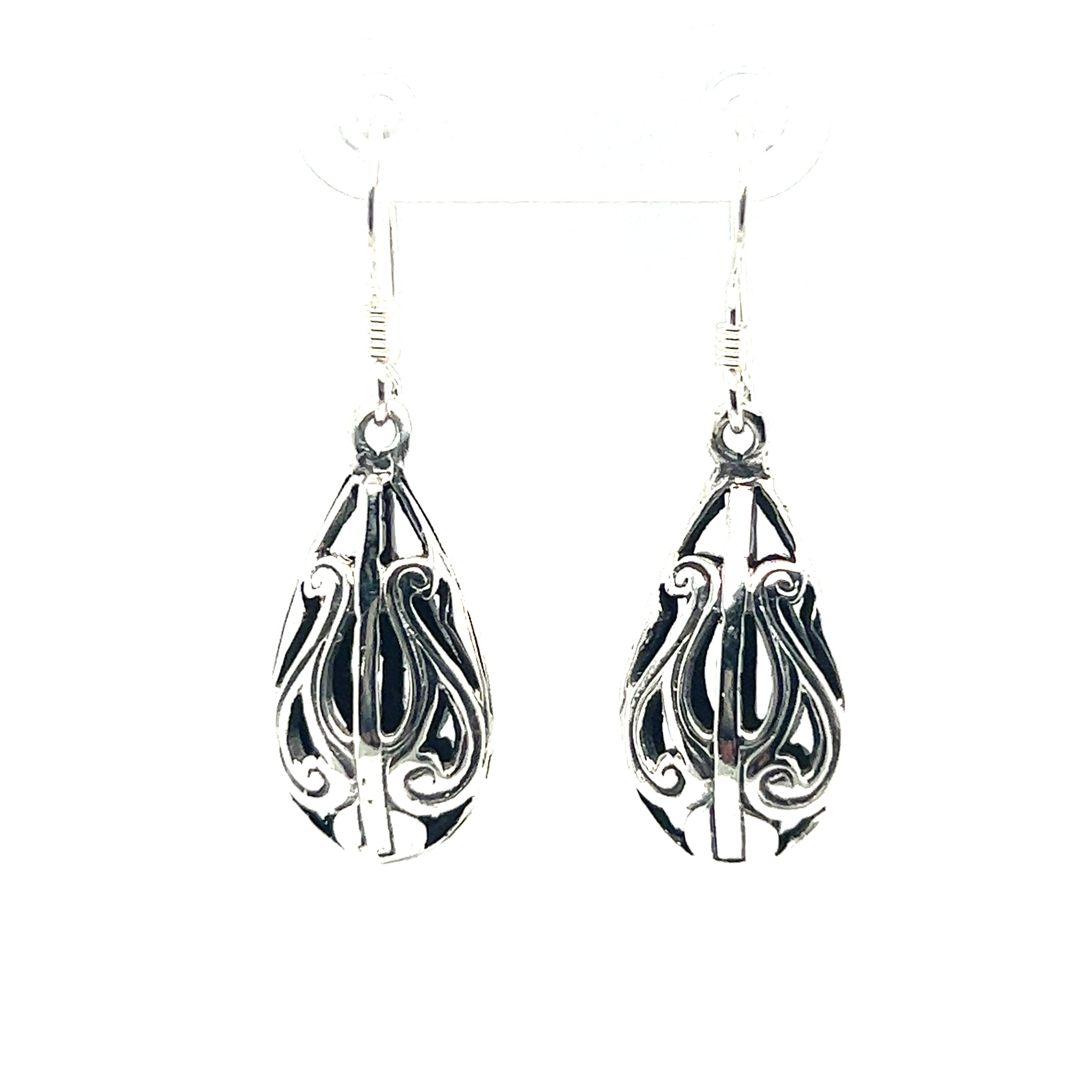 A pair of Super Silver Filigree Teardrop Earrings, perfect for a boho aesthetic.