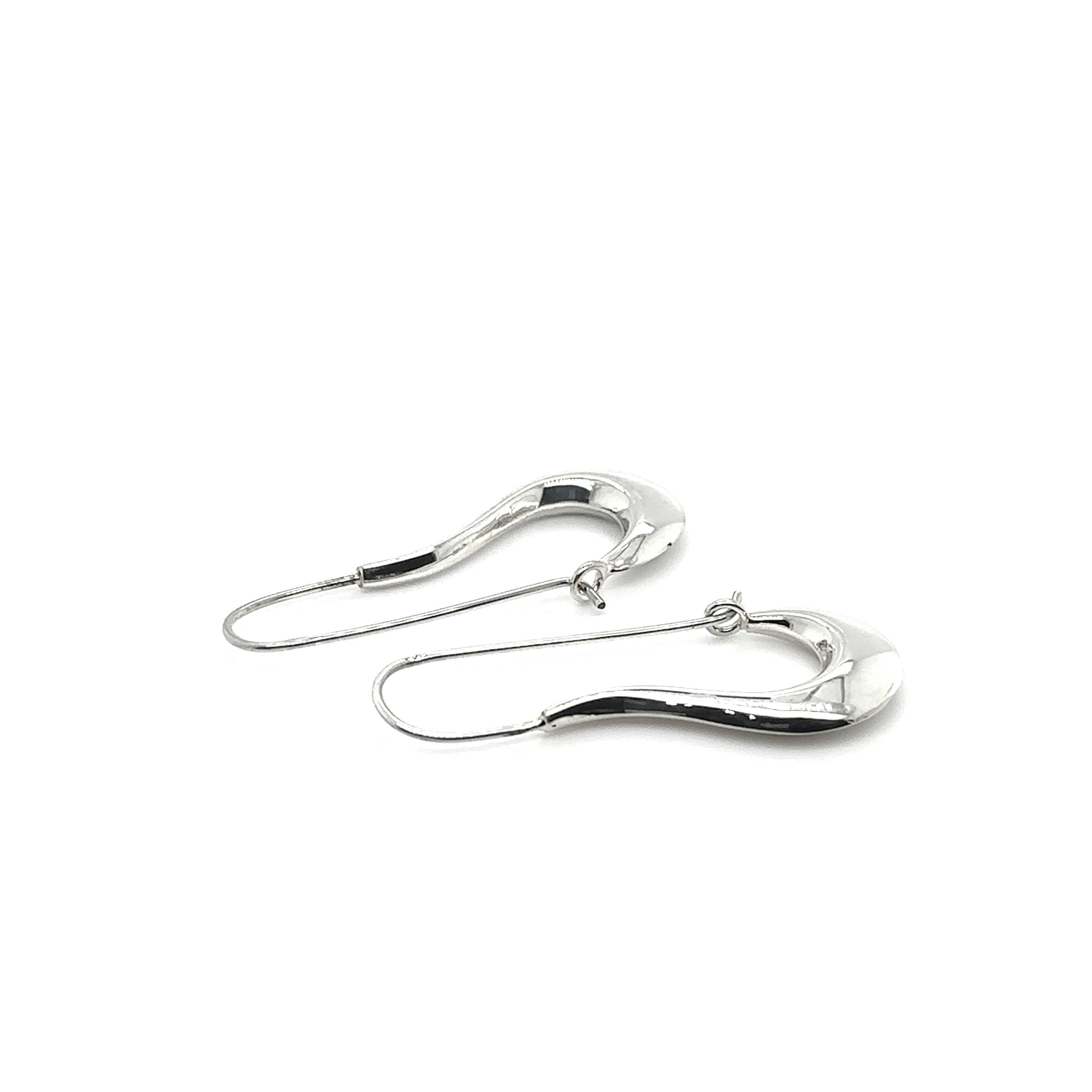 A pair of Curved Hoop Earrings with a smooth surface.