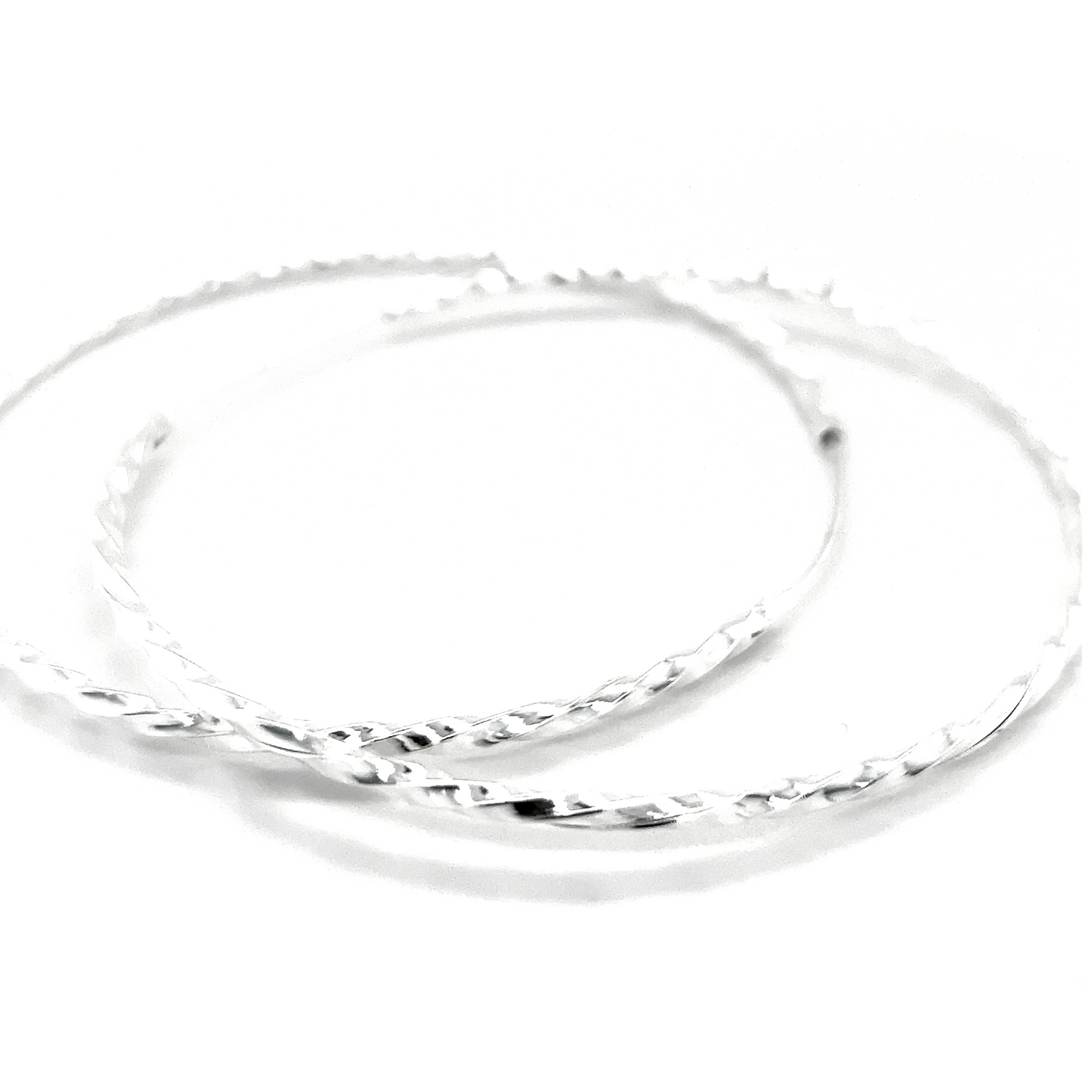 
                  
                    Two intertwined 70mm Twisted Hoops bangle bracelets on a white background.
                  
                