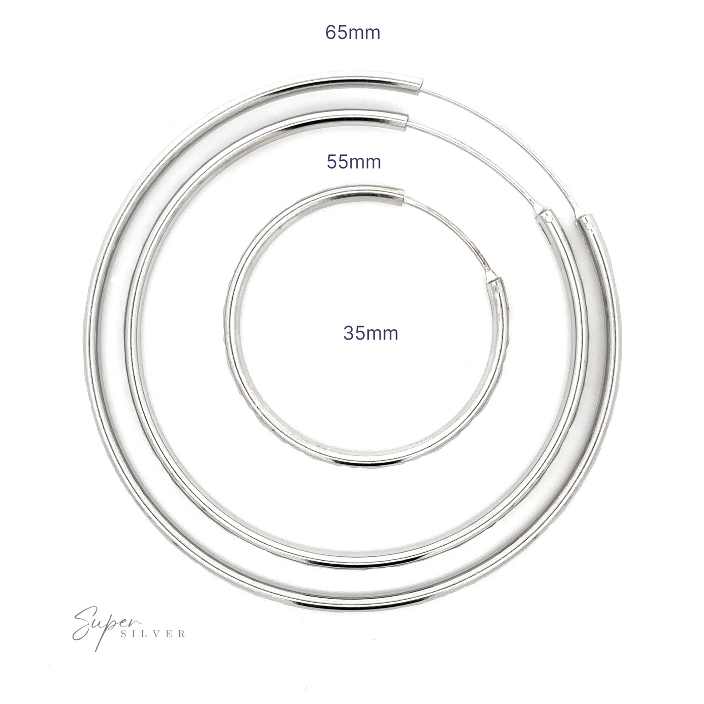 
                  
                    Three Modern 3mm Rhodium Finish Facet Hoops of varying sizes, labeled as 35mm, 55mm, and 65mm, showcased in a top-down view on a white background.
                  
                
