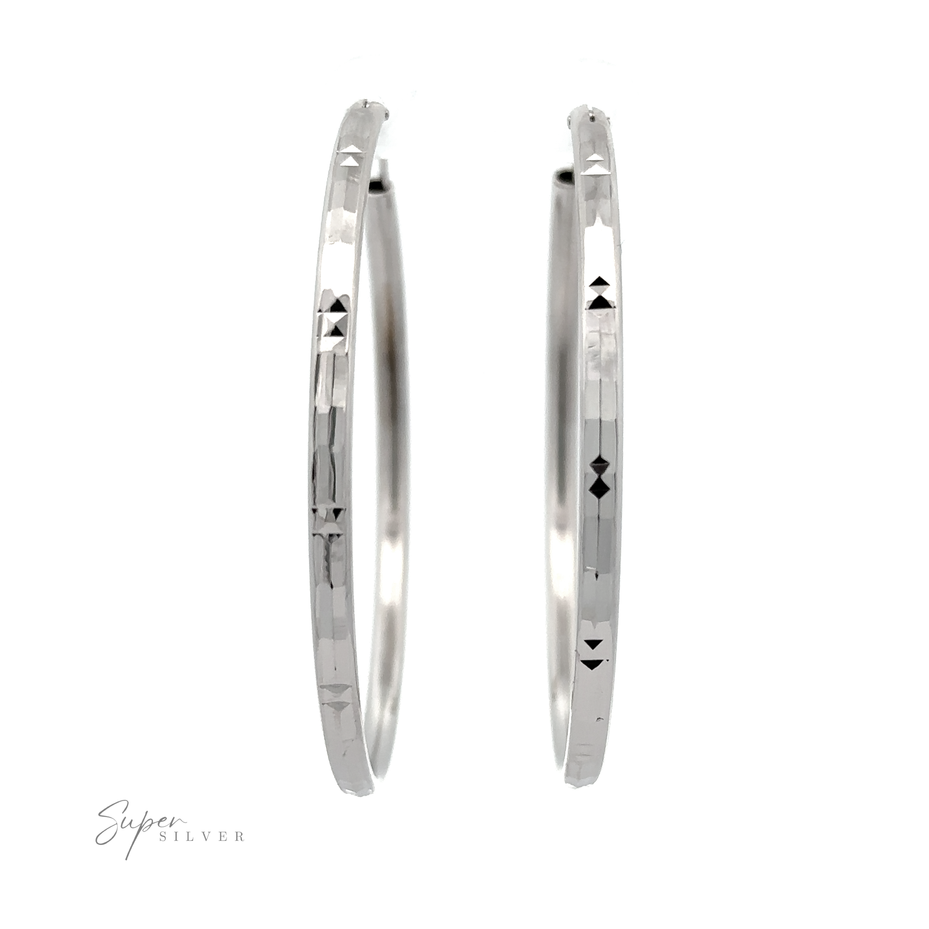 A pair of Modern 3mm Rhodium Finish Facet Hoops with geometric cut-out patterns, displayed against a white background with "super silver" written in cursive at the bottom.