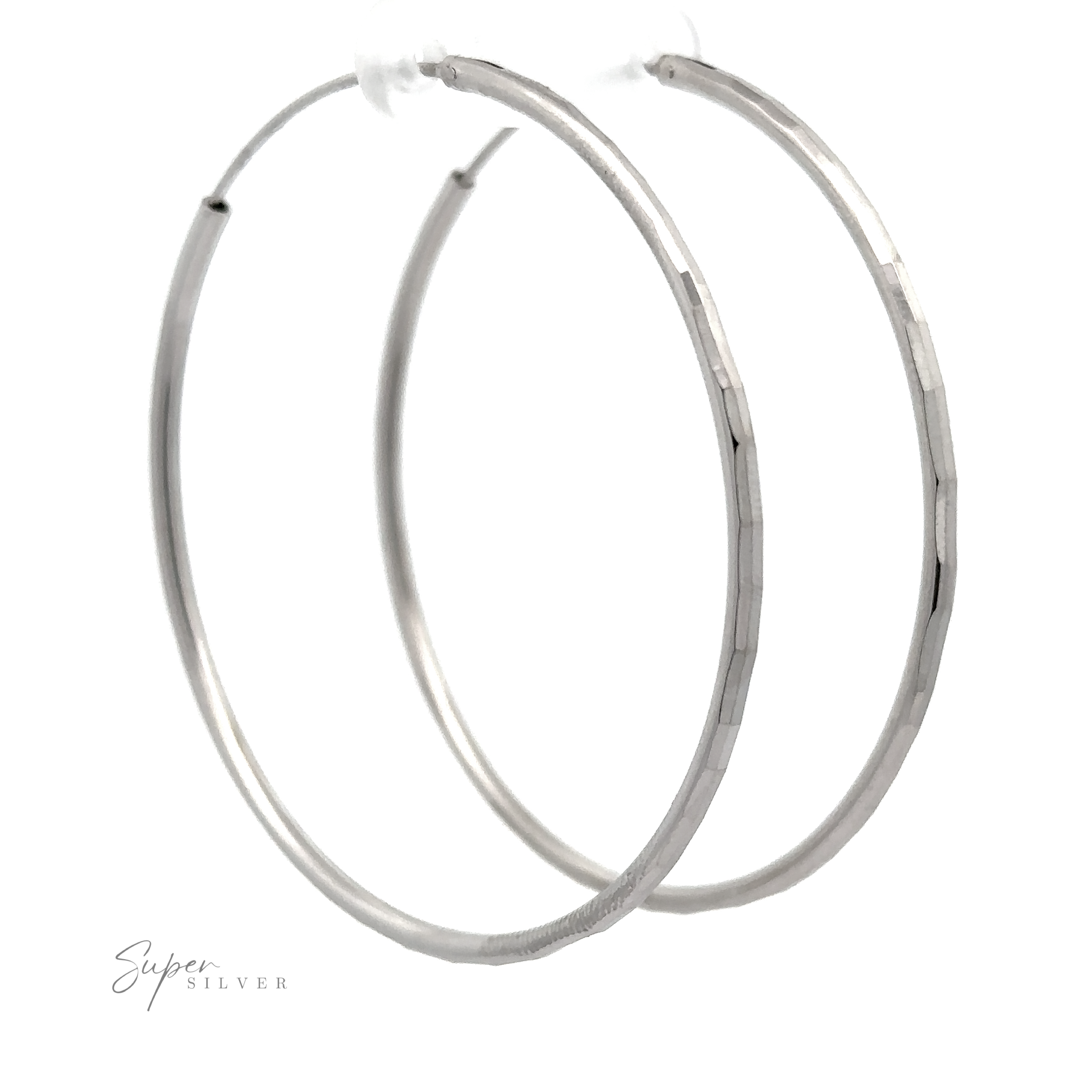 A pair of 2mm Diamond Cut Hoop Earrings with a diamond faceted texture, displayed against a white background with a faint "super silver" signature at the bottom left.