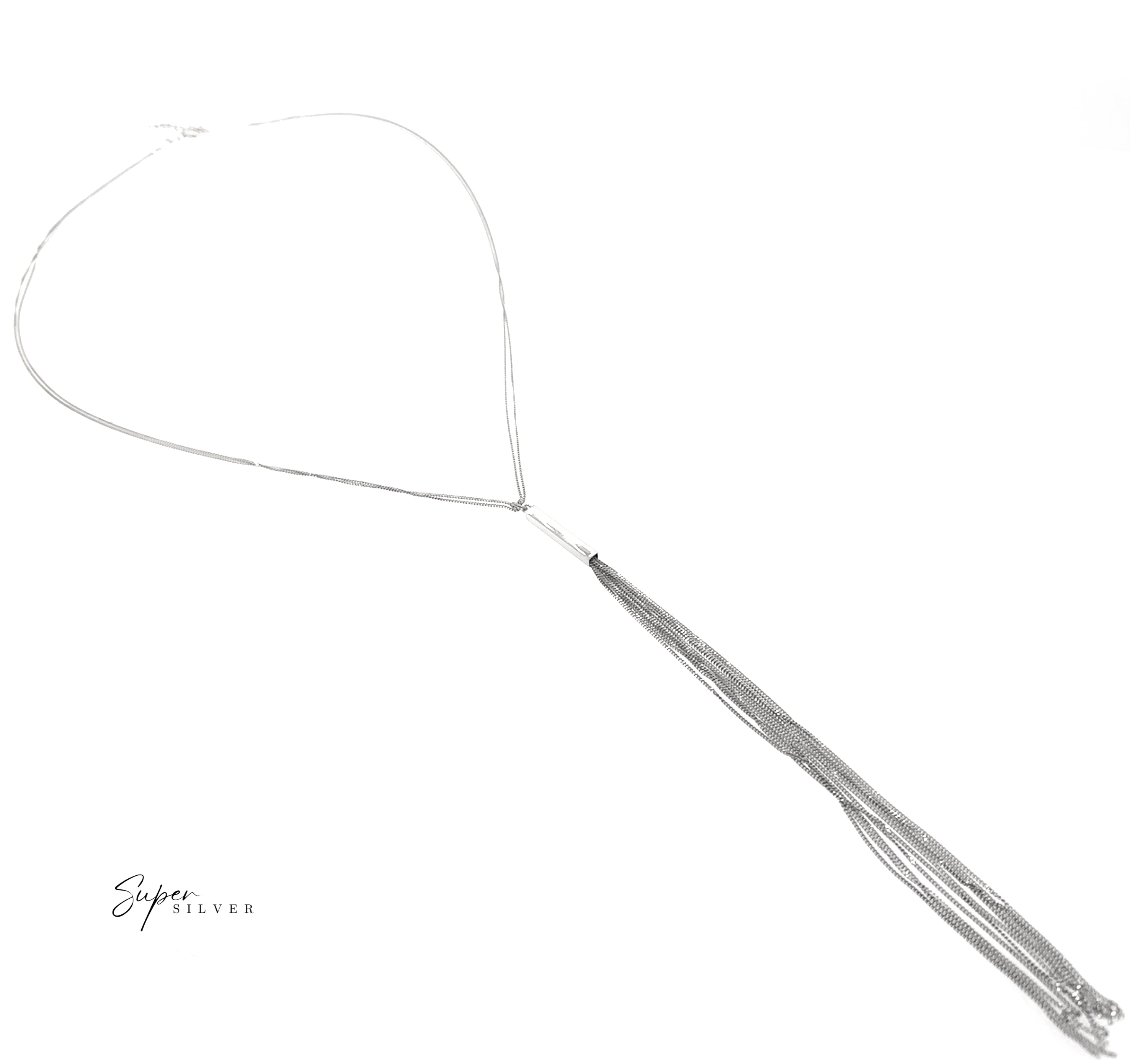 The Tassel Italian Chain Necklace, featuring a sleek silver chain and long tassel pendant, showcases modern elegance against a white background with the "Super Silver" logo in the bottom left corner.