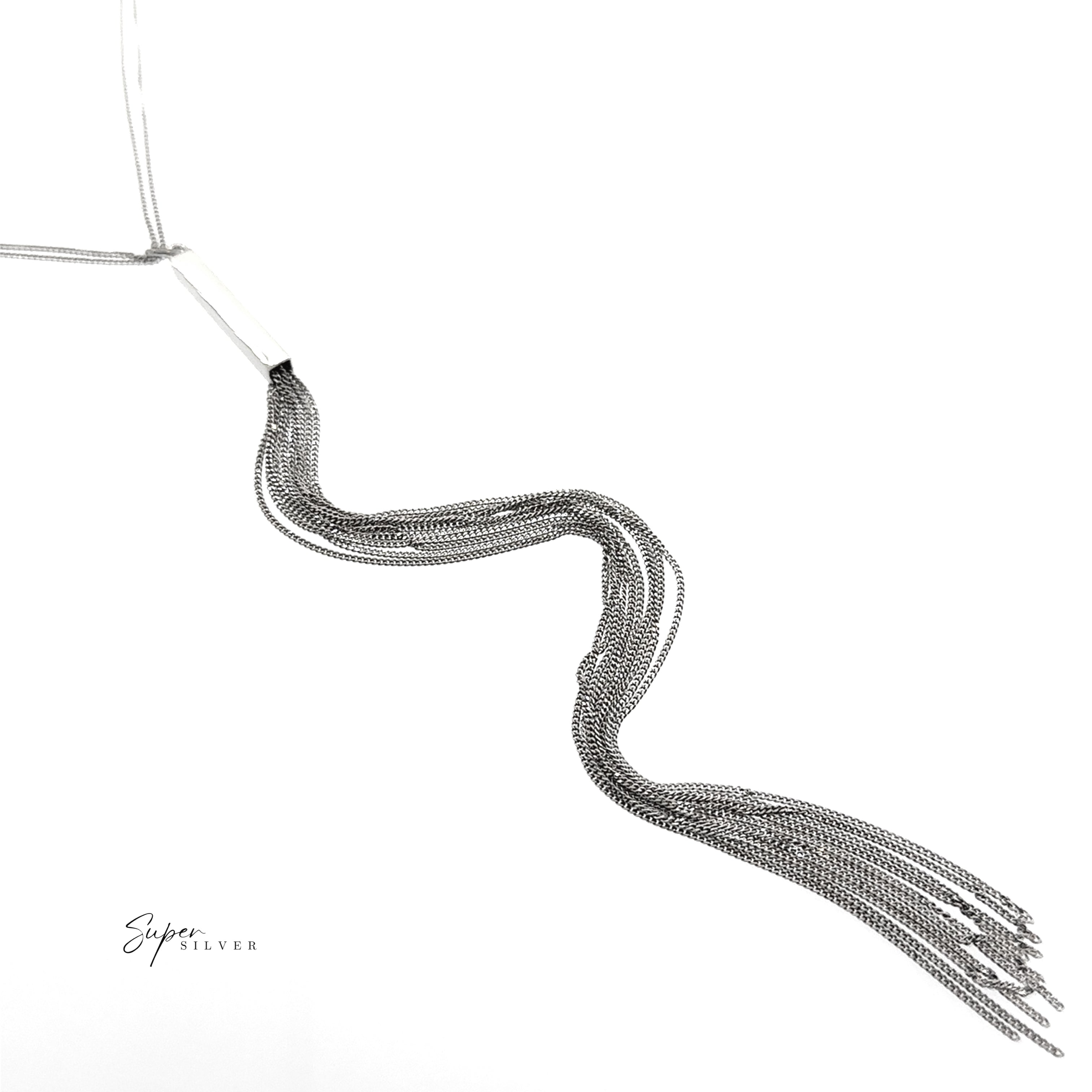 The Tassel Italian Chain Necklace features multiple fine silver chains in a wavy tassel design, radiating modern elegance against a white background.