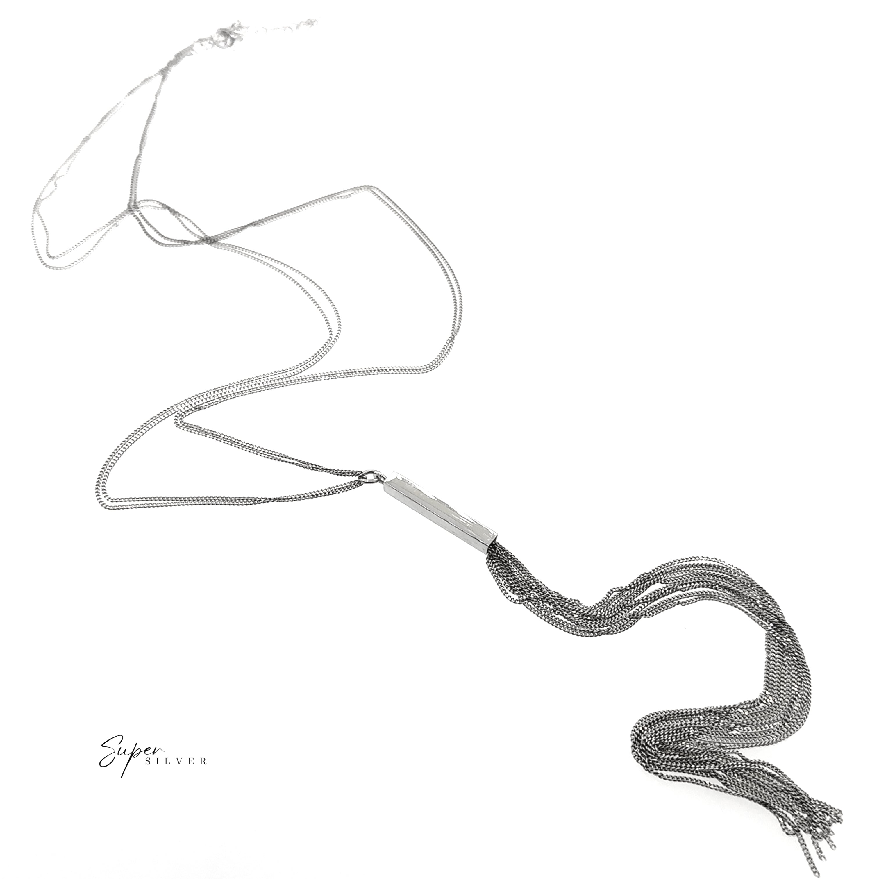 The Tassel Italian Chain Necklace, a long silver piece with a rectangular bar pendant and multiple chain tassels, embodies modern elegance on a white background. "Super Silver" is shown in the lower left corner.