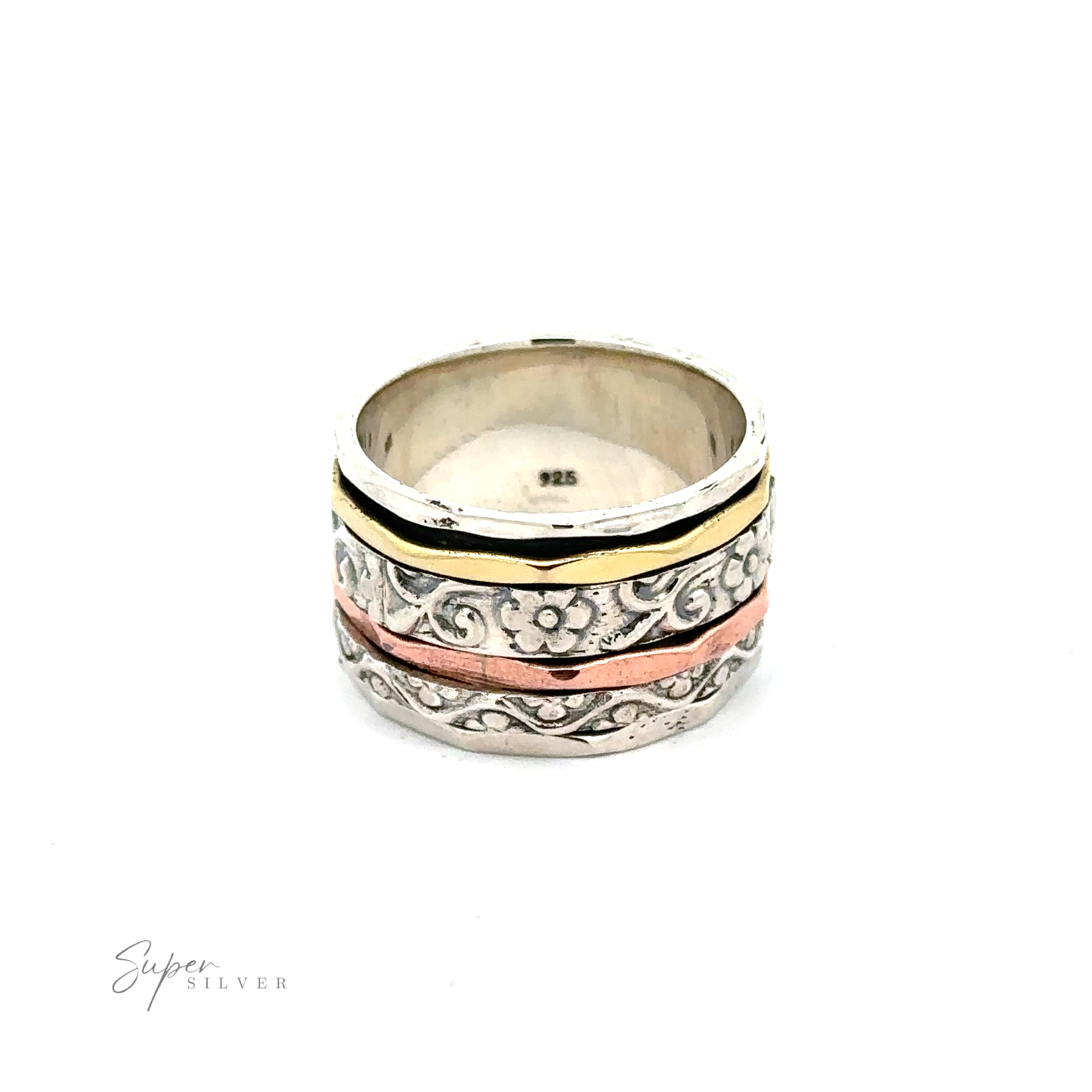A Handmade Spinner Band with Flower Etching ring with an intricate design featuring etched flowers.