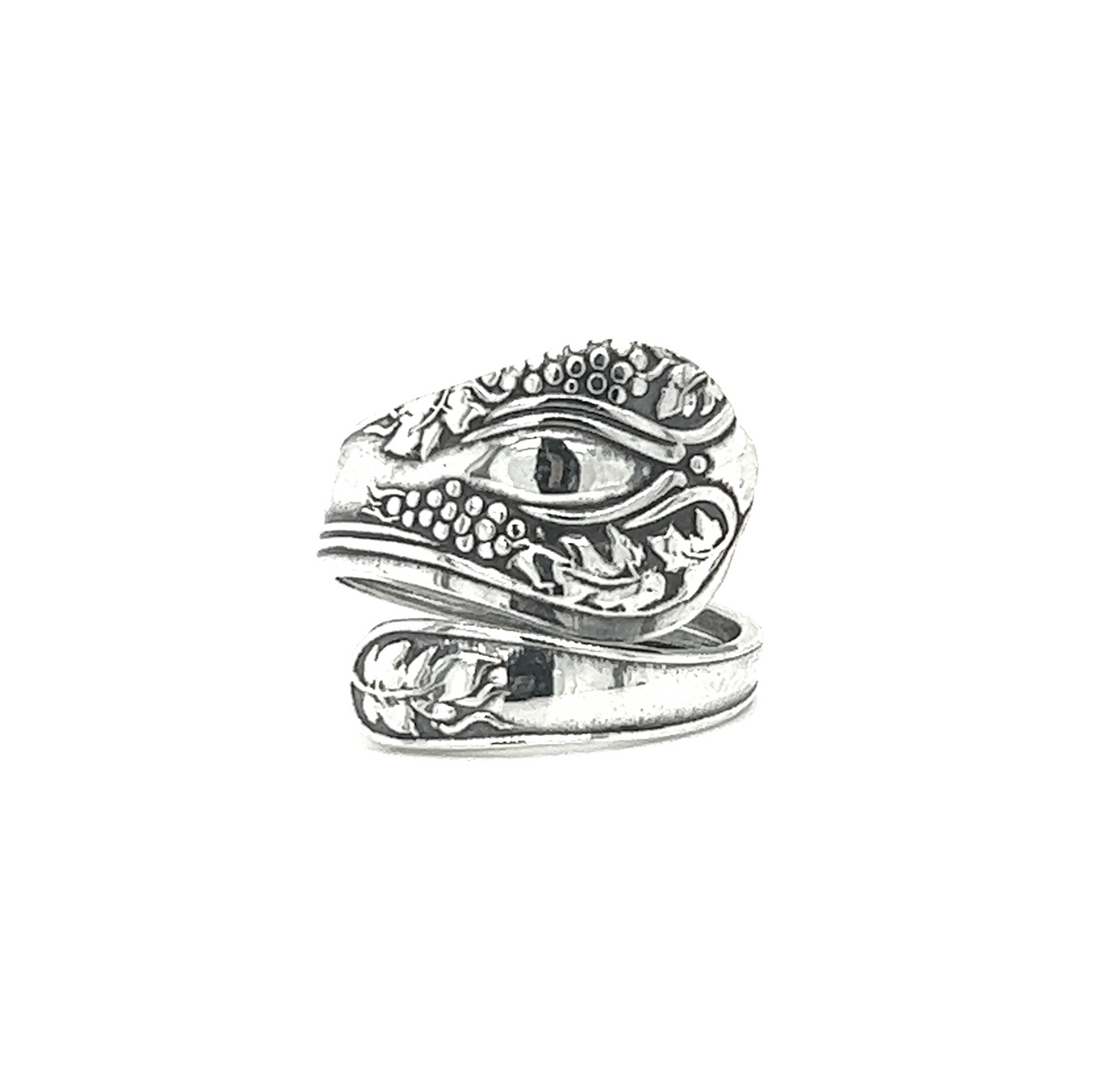 A Timeless Spoon Ring with an eye on it, exuding old-world romance.
