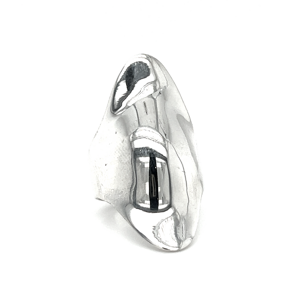 
                  
                    A Large Shield Ring with a curved shape, radiating boho allure.
                  
                