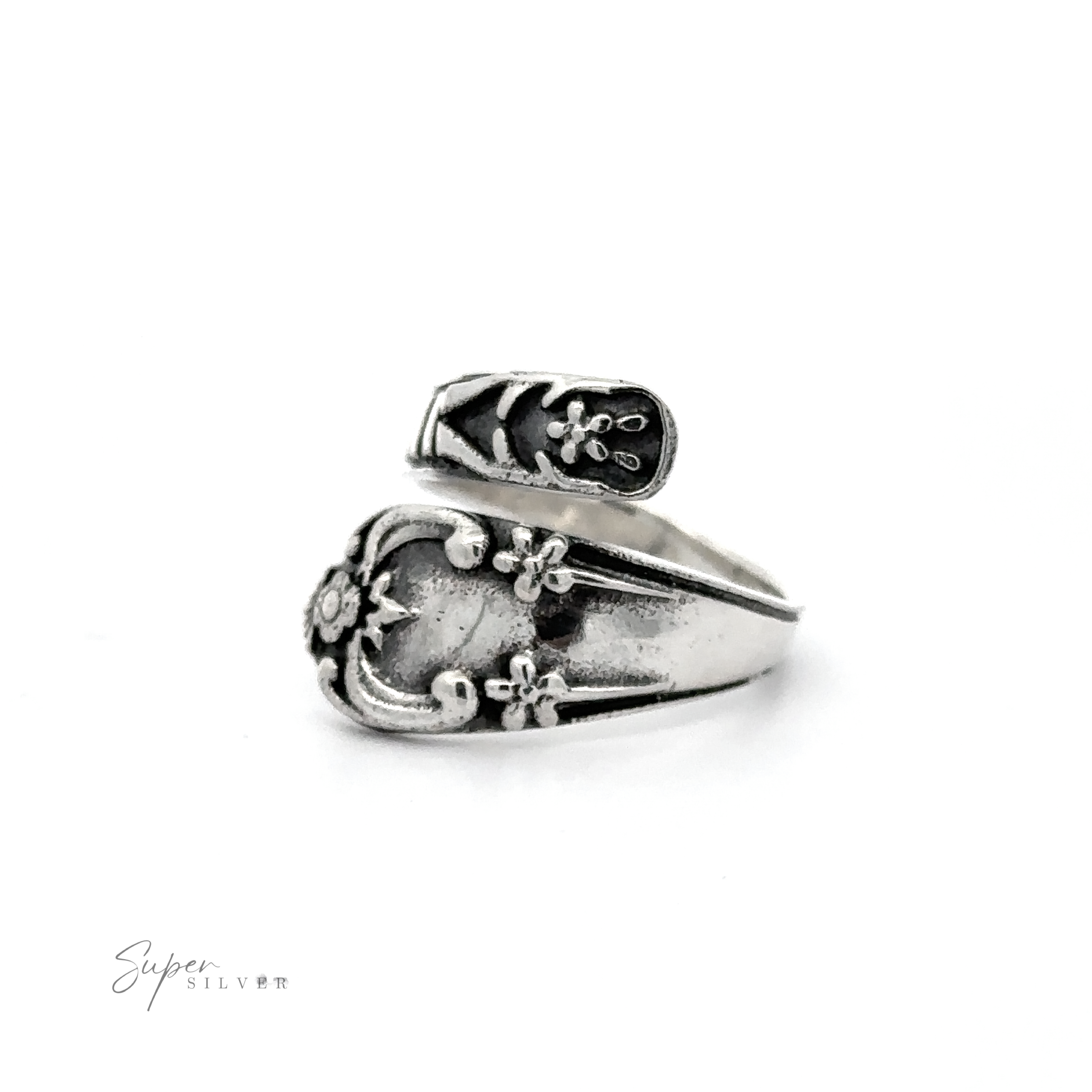 A Spoon Design Ring with an adjustable band and a design on it, made of .925 Sterling Silver.