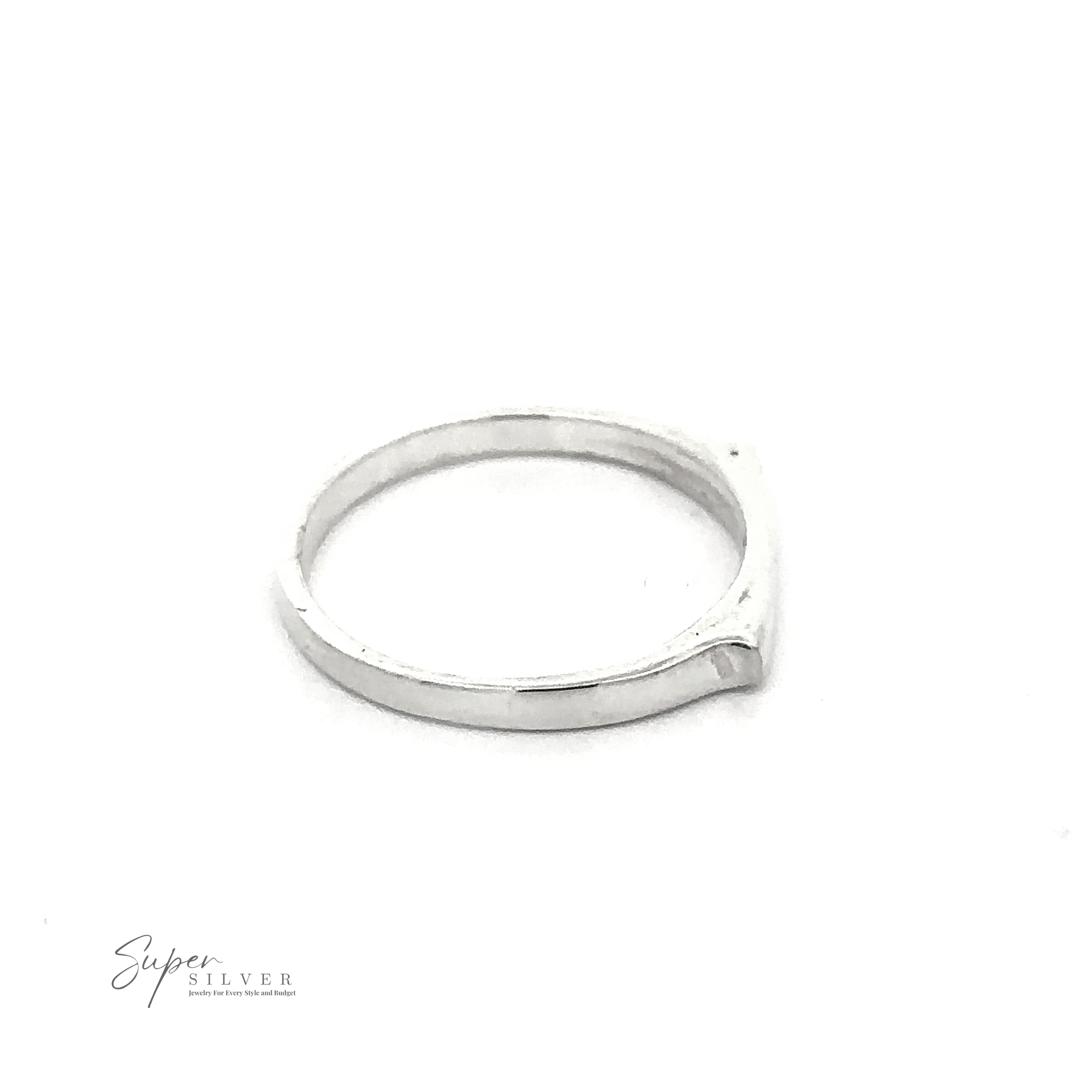 A Dainty Silver Bar Ring is displayed against a white background. Embracing modern minimalism, the ring features a simple and minimalist design. The logo "Super Silver" is visible in the bottom left corner.