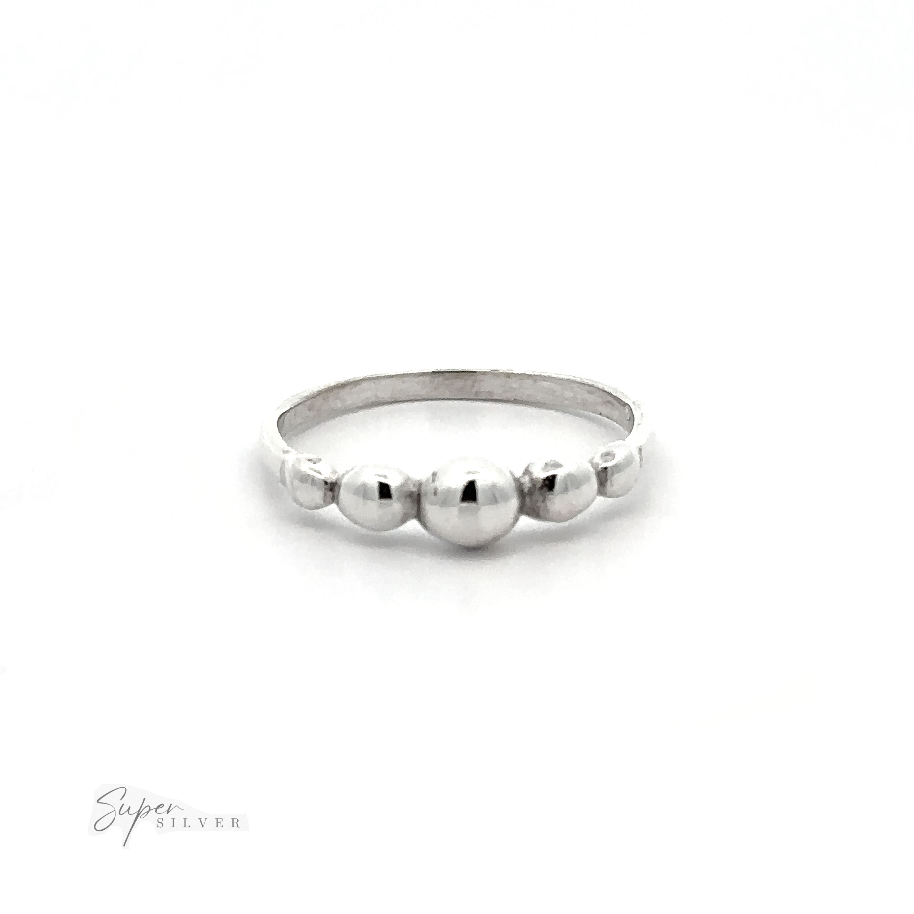 A Dainty Graduated Silver Ball Ring with a modern design featuring graduated patterned balls on it.