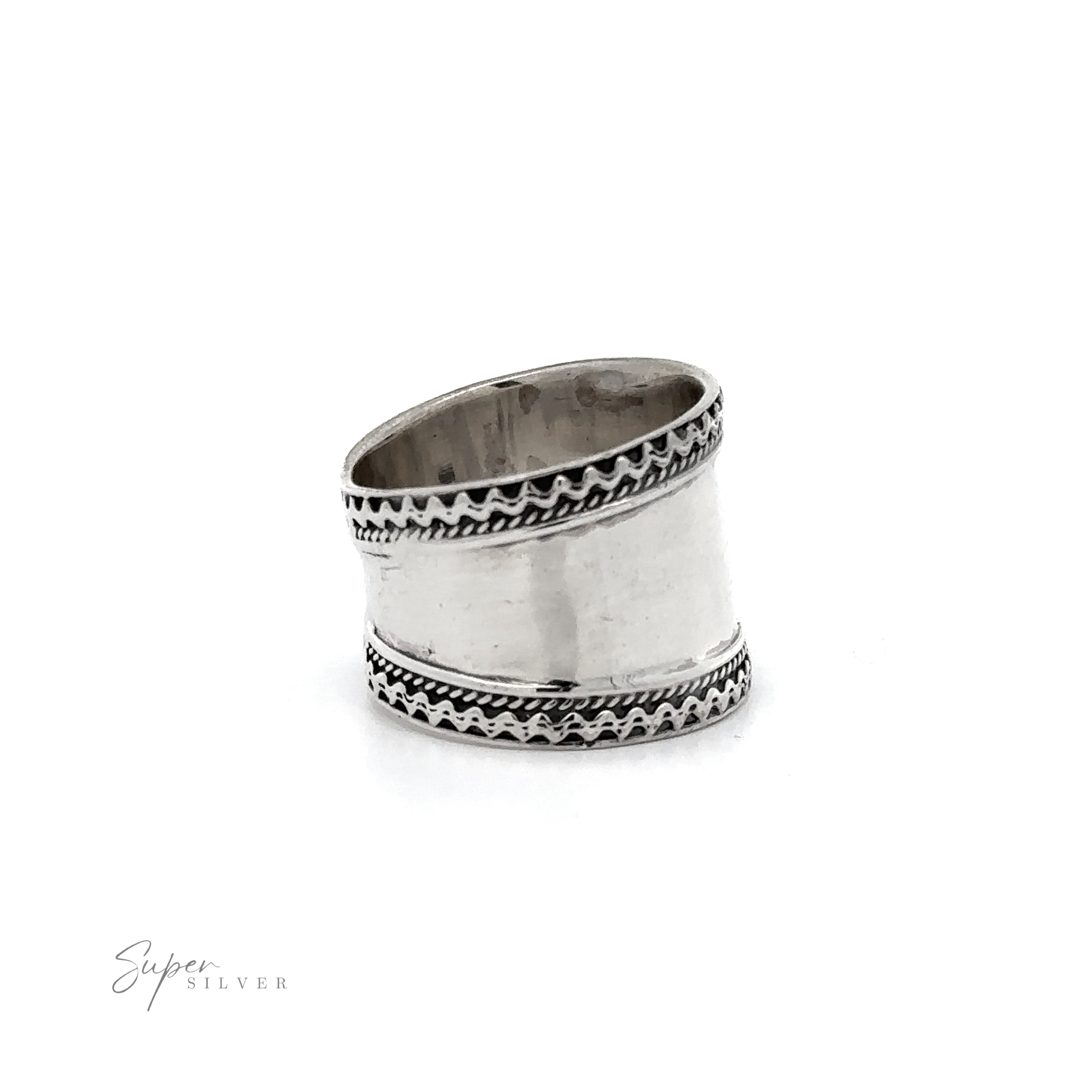 A Wide Silver Band with Etched Border.