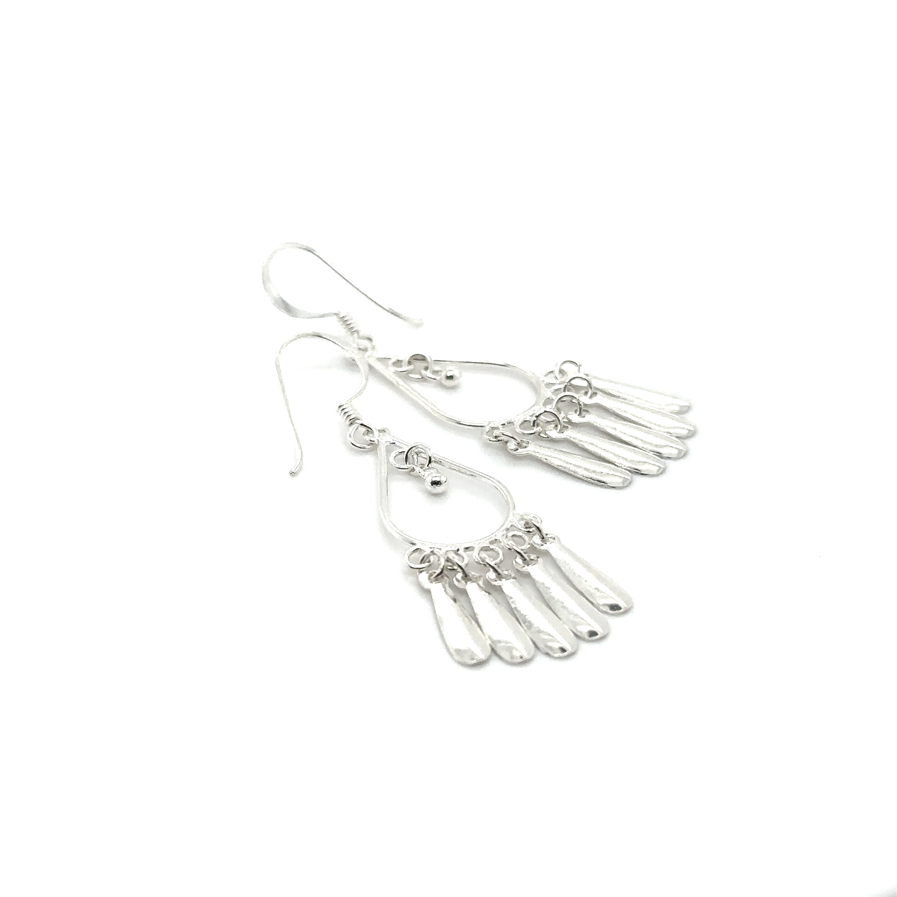 A pair of Teardrop Tassel Earrings by Super Silver on a white background.