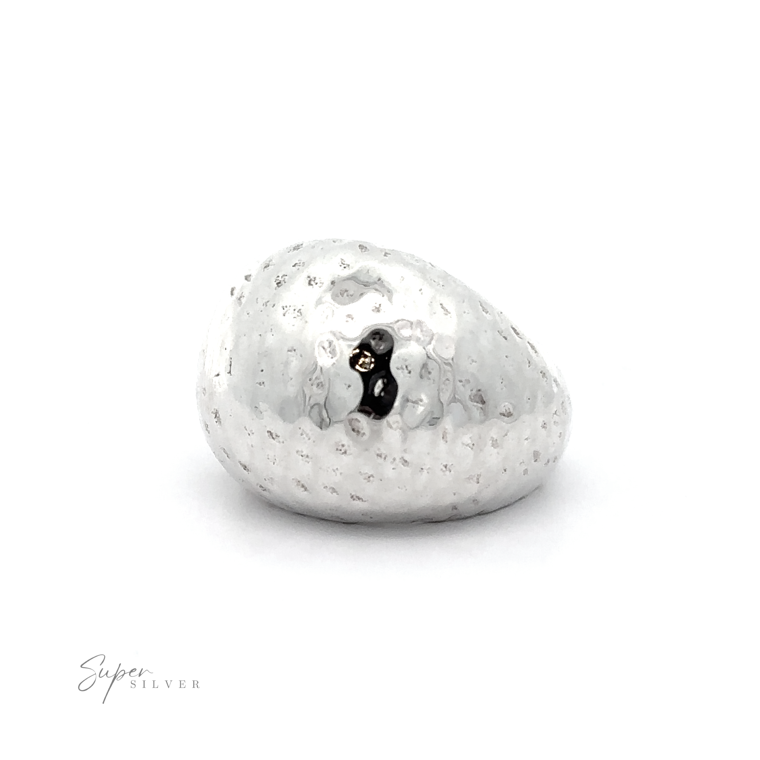 A bold Statement Hammered Ring, featuring a silver hammered band with a striking black dot.